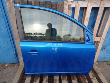 Nissan Note E11 передні праві двері BV4 № 58 Скло синій