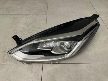 FORD FIESTA MK8 ЛЕВАЯ ПЕРЕДНЯЯ ЛИНЗОВИДНАЯ ЛАМПА + LED H1BB-13W030-CD