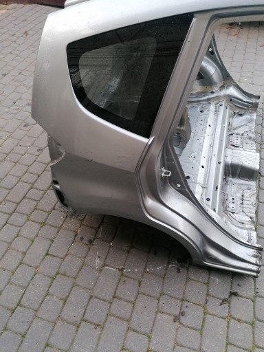 PAS TYLNY BŁOTNIK LEWY NH642M HONDA JAZZ III 08- - 4