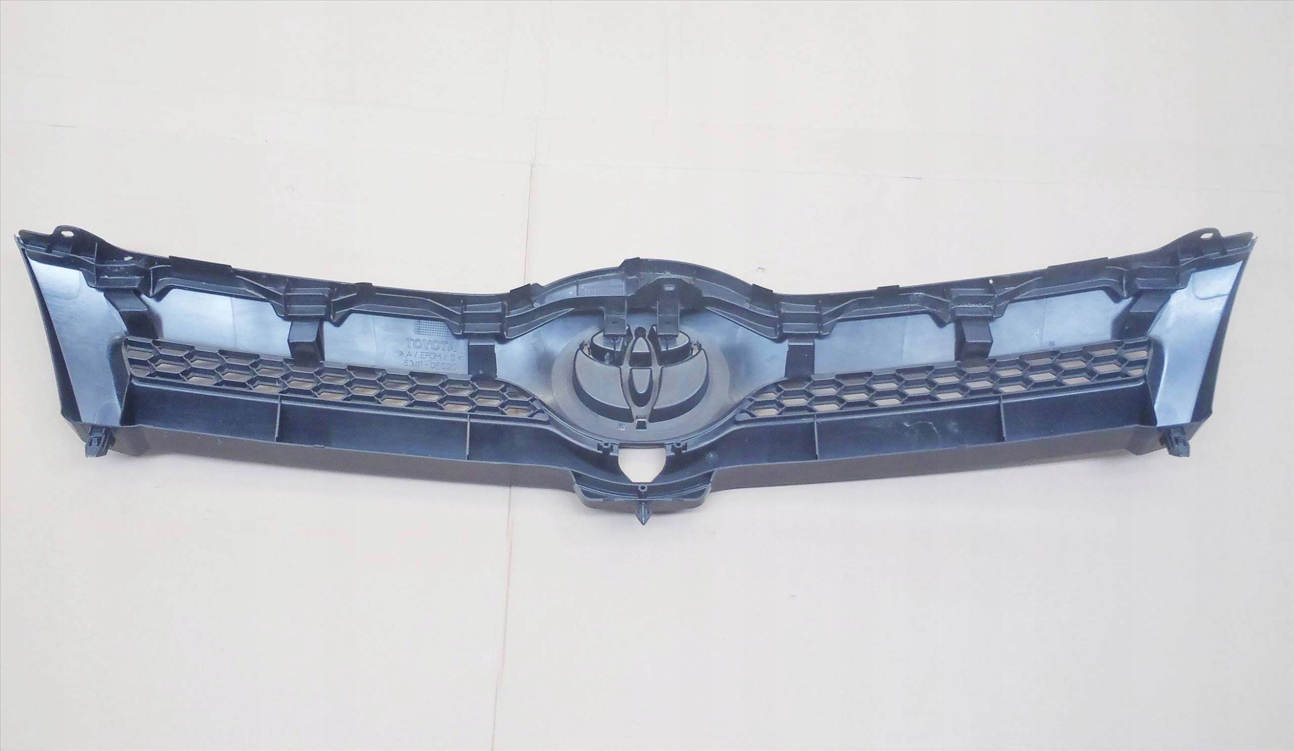 COROLLA VERSO 04-07 ATRAPA LISTWA UCHWYT KAMERA Producent części Toyota OE