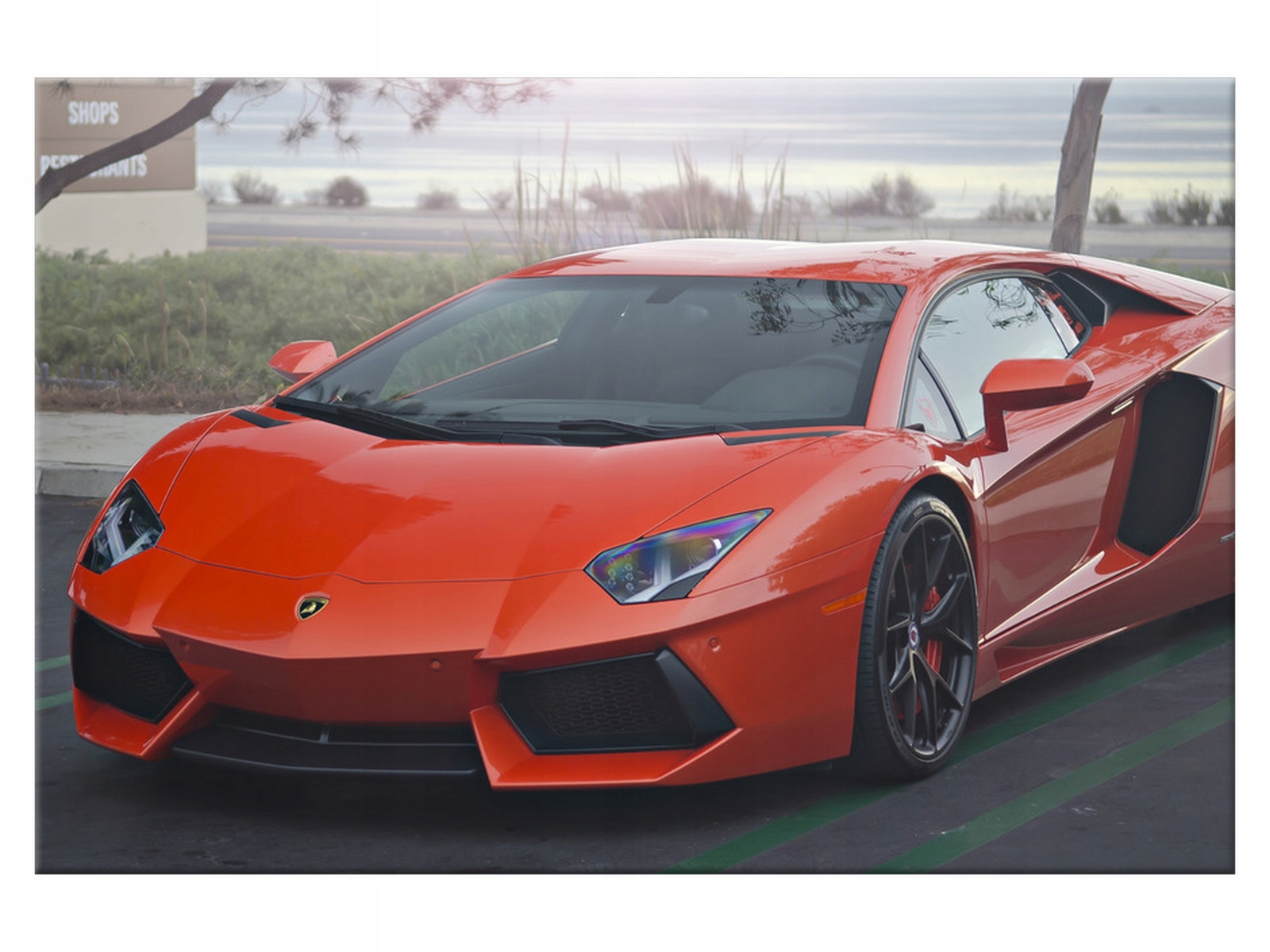 

Obraz Pomarańczowe Lambo 60x40 Pejzaż 1690A_1E