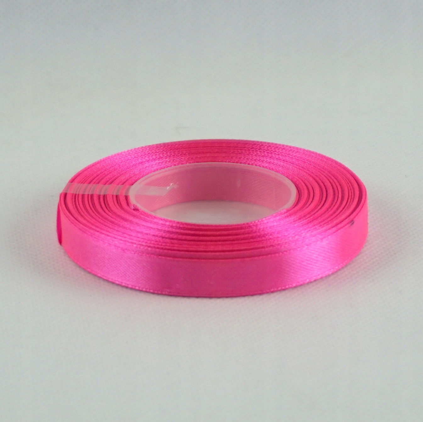 

Taśma atłasowa 12mm/32m Ostra Różowa