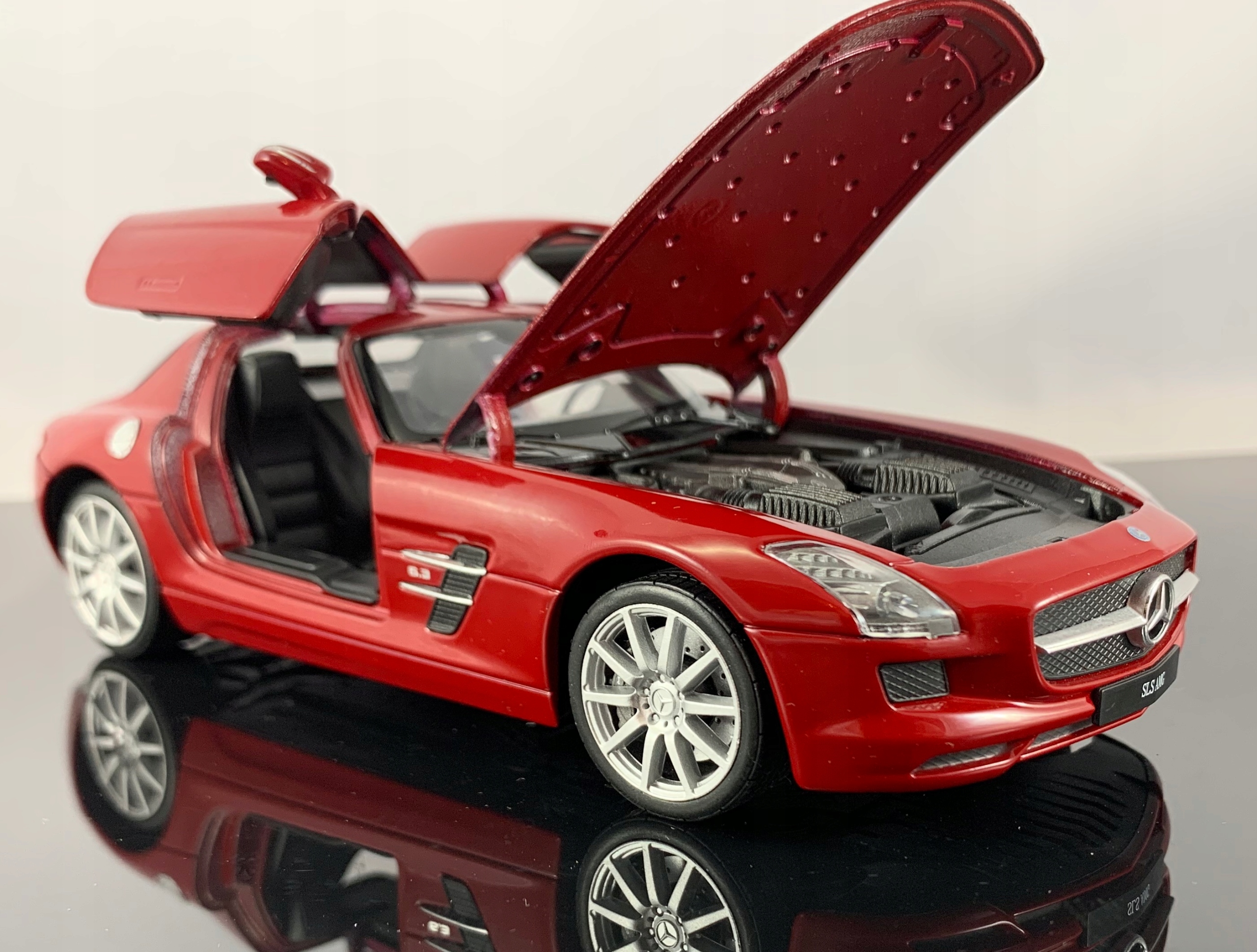 Модели машин магазины. Welly Mercedes-Benz SLS AMG. Модель Mercedes Benz SLS AMG 1:24. Модель Форд Мустанг 1 43. Welly Мерседес 1:64.