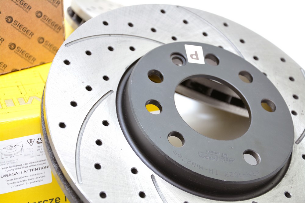 Sportowe tarcze klocki PRZOD Opel ASTRA H 04 14 Discs type perforated