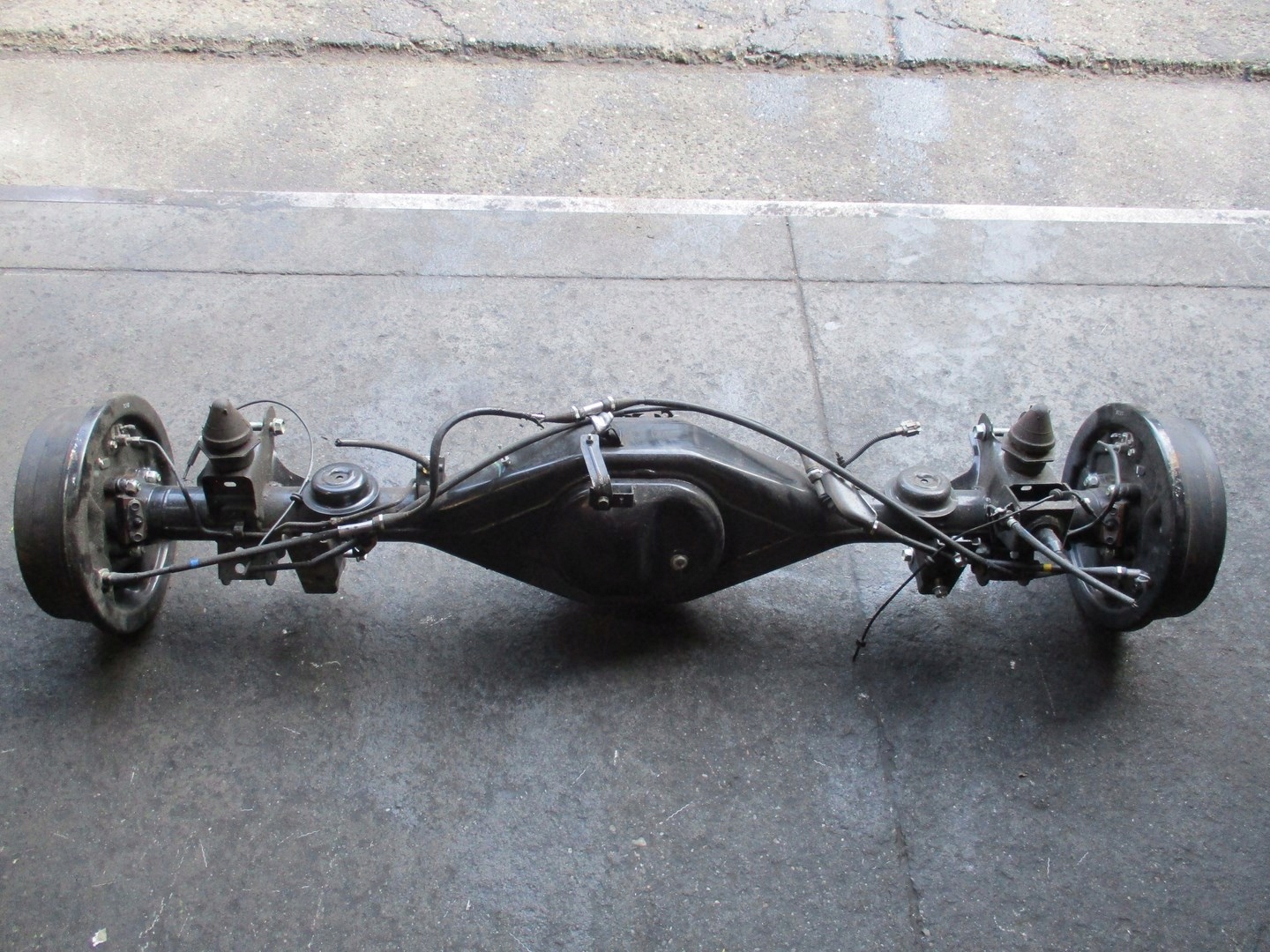 Zawieszenie tylne most NISSAN NAVARA 2,3D 17R 4X4