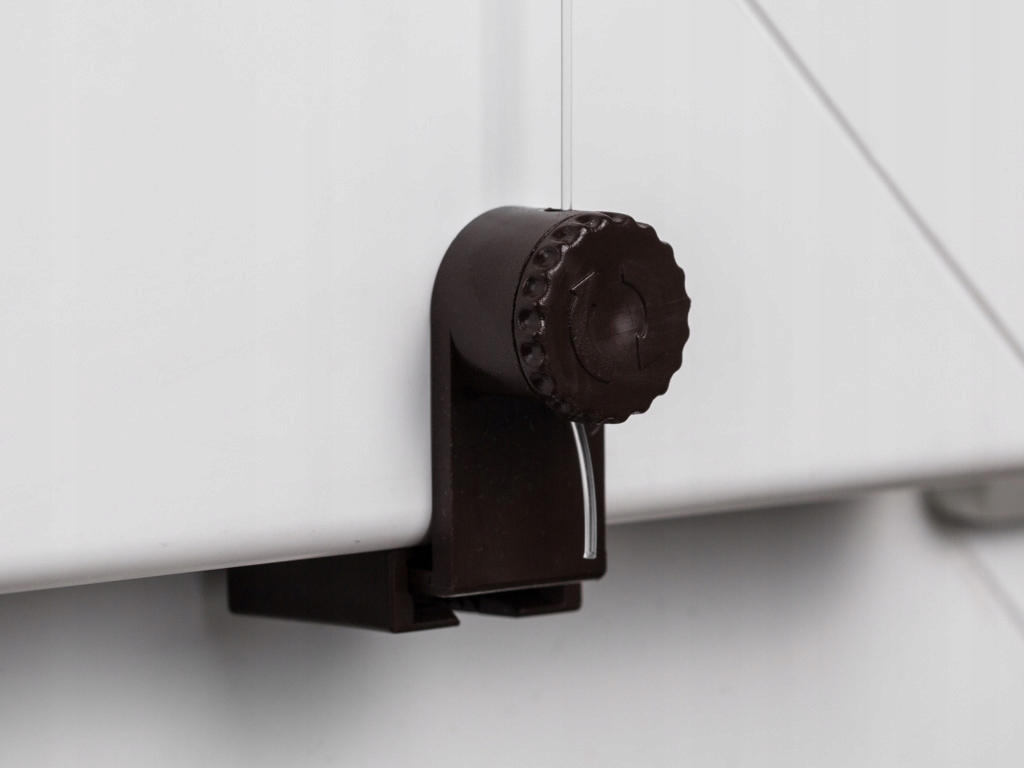 DOLNY REGULOWANY UCHWYT Z NAPINACZEM ŻYŁKI ROLETY Marka inna