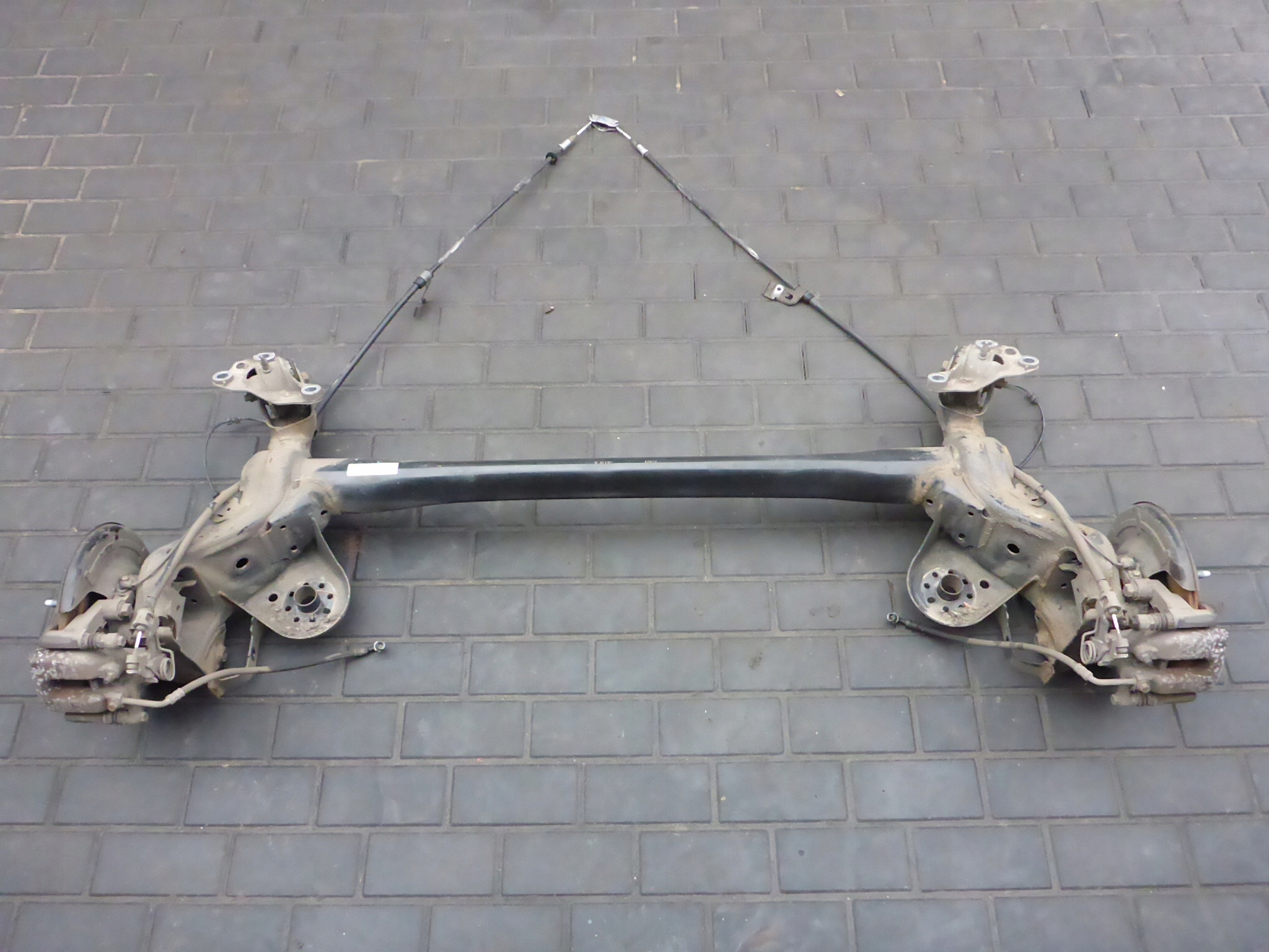 BELKA ZAWIESZENIA TYŁ OPEL ASTRA V K HB 15-