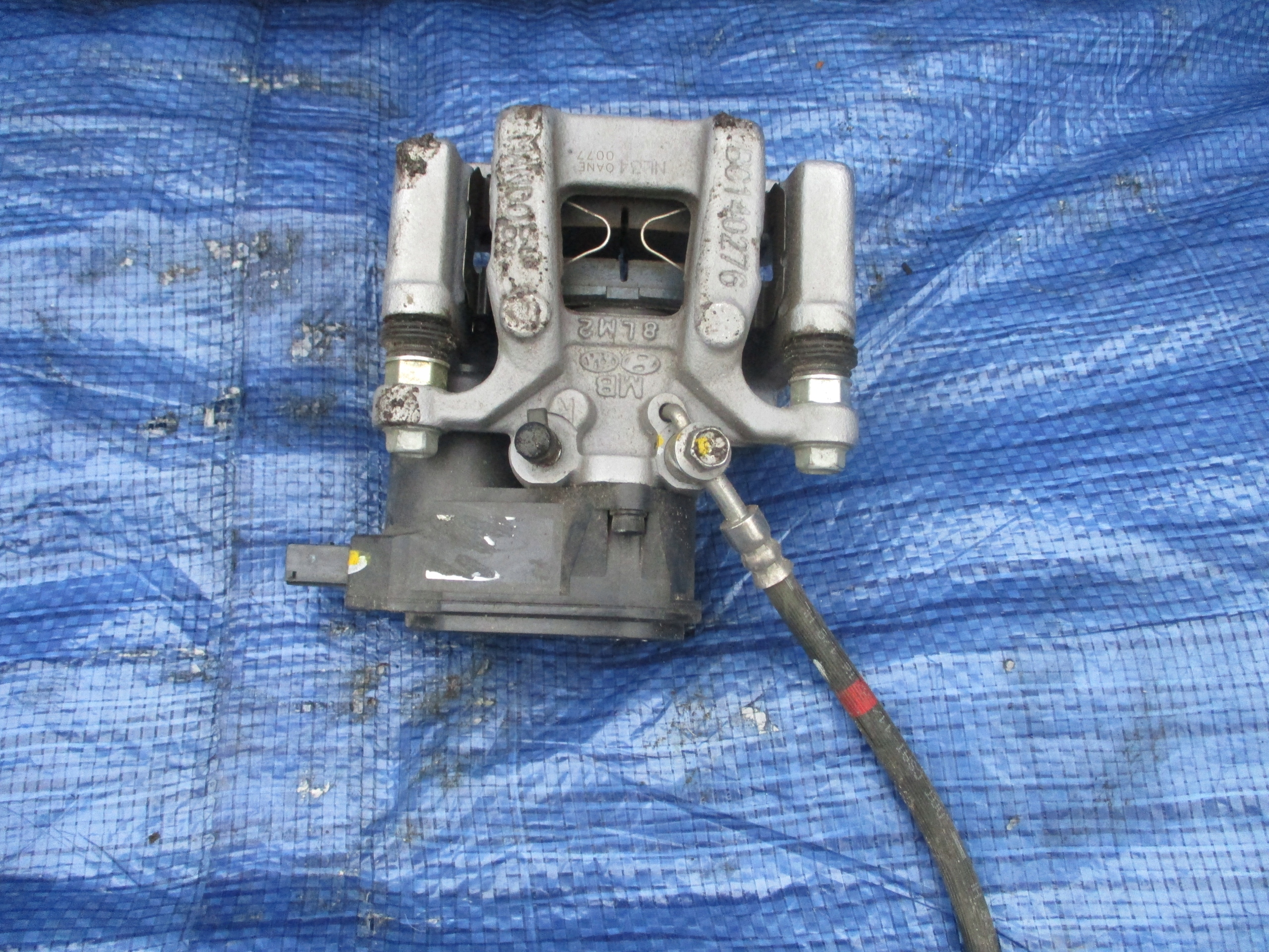 ZACISK PRAWY TYŁ ELEKTRYCZNY HYUNDAI TUCSON 2019