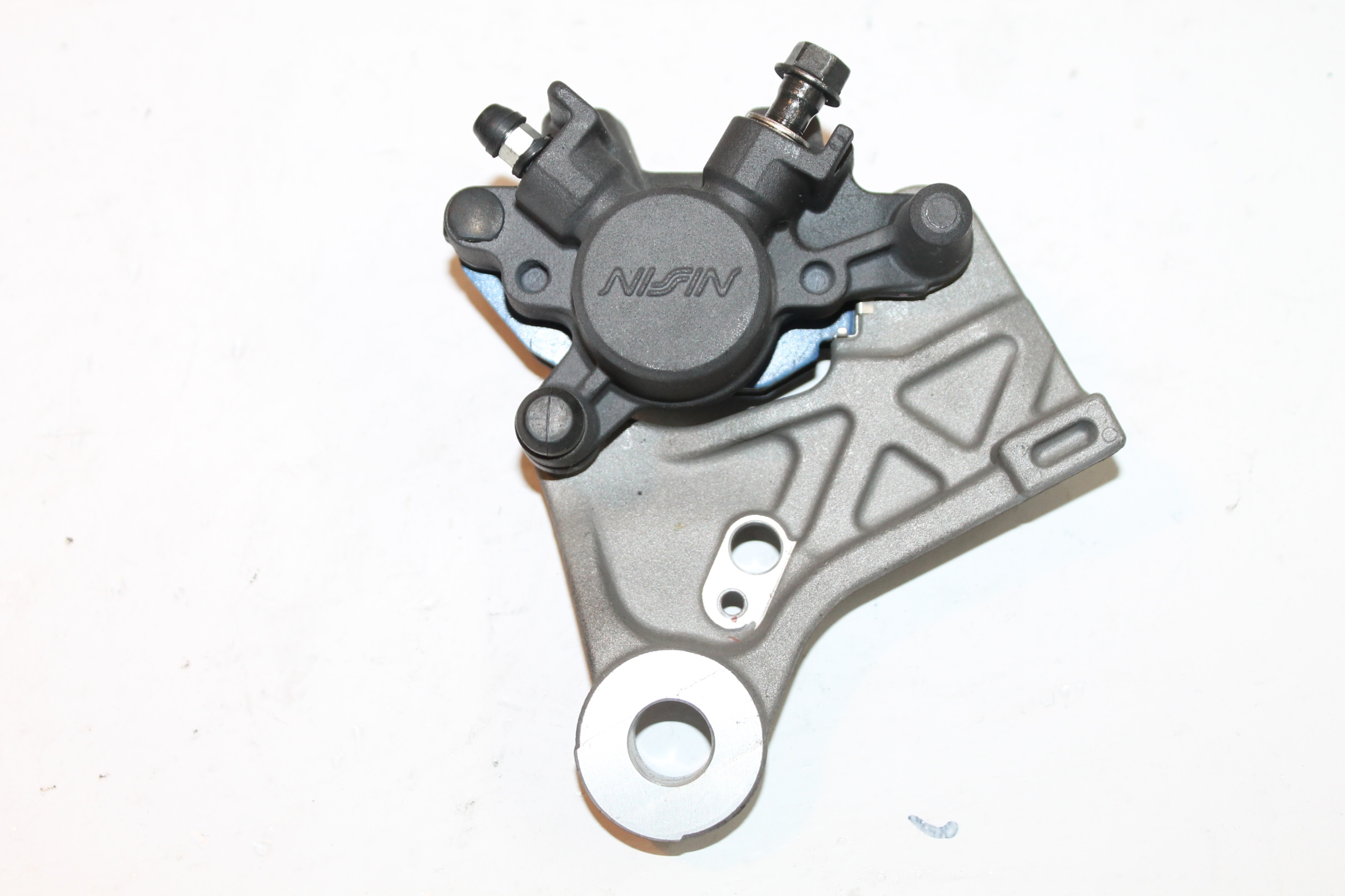 HONDA CB 125 R 2018 ZACISK HAMULCOWY TYŁ TYLNY