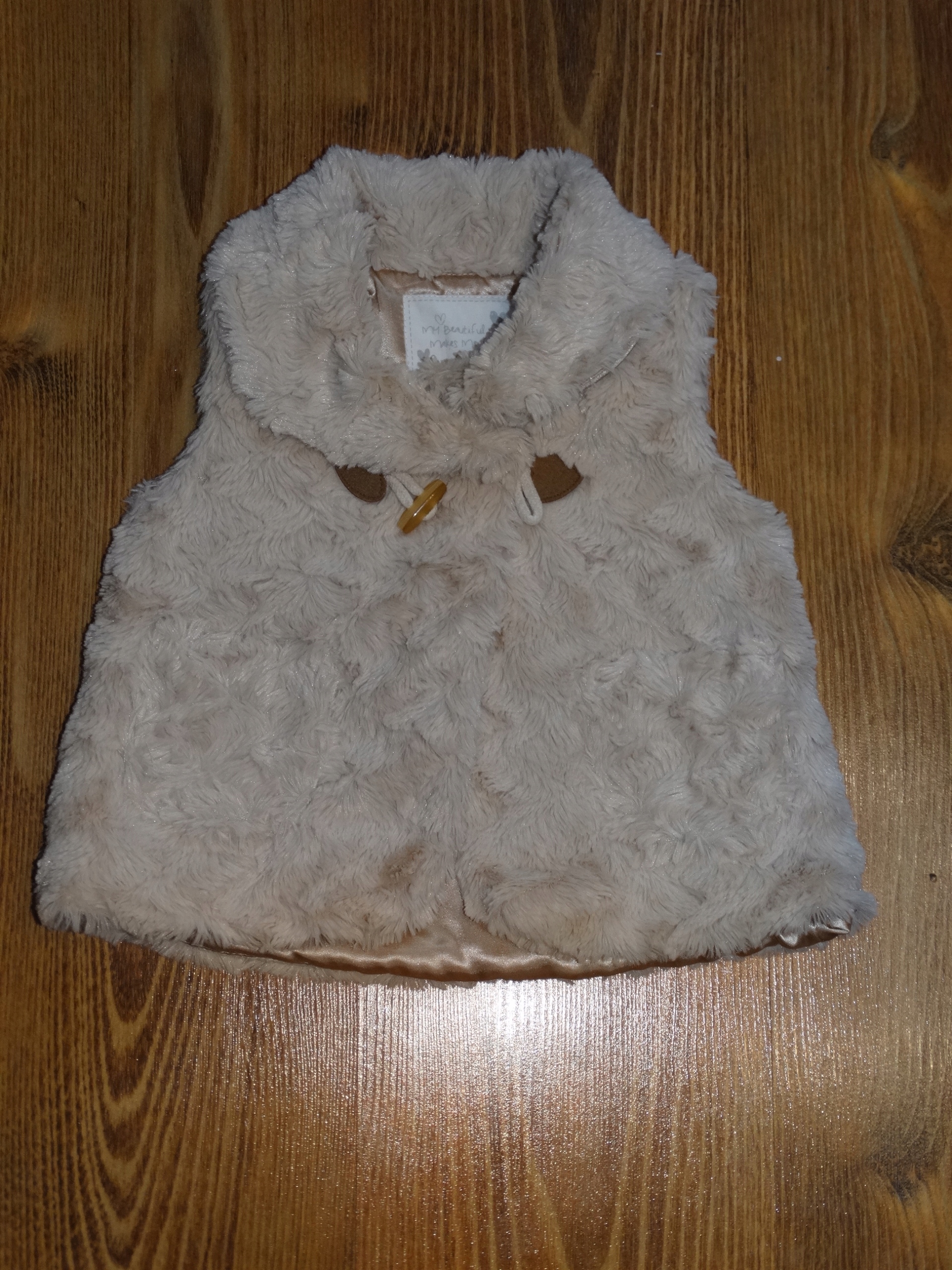 Matalan kamizelka futerko 9-12m