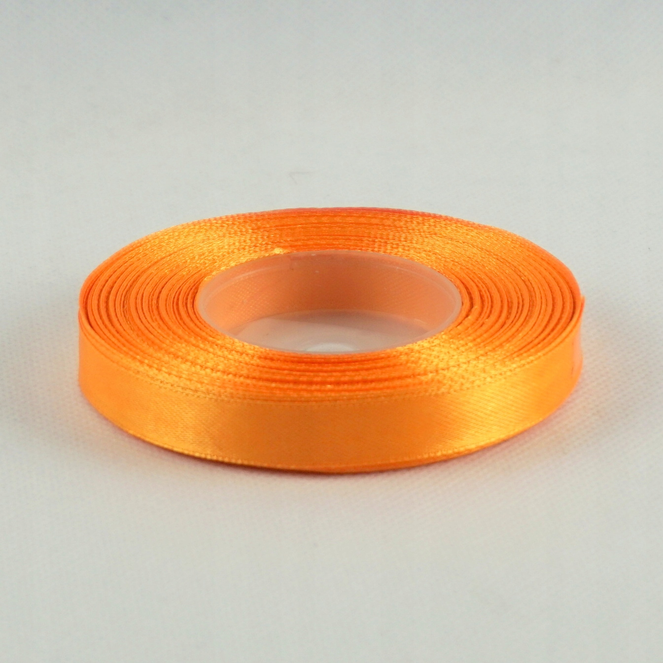 

Taśma atłasowa 12mm/32m Jasna Pomarańczowa