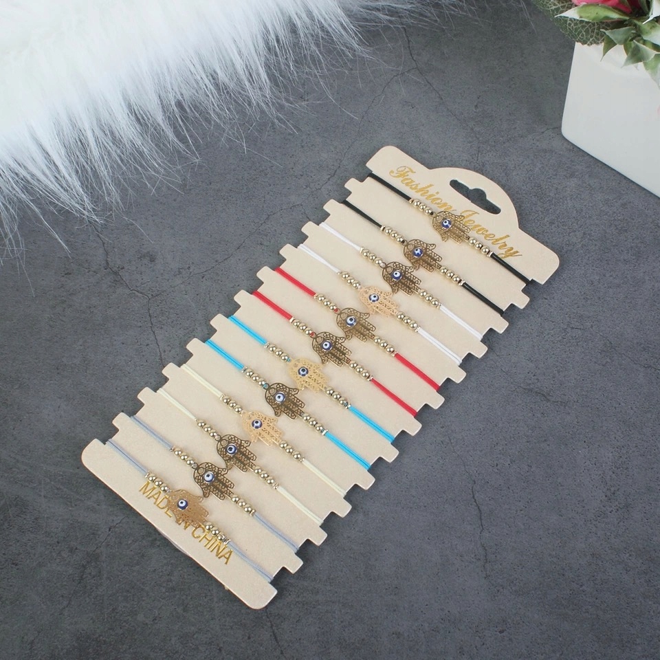 

Czerwona sznurkowa bransoletka oko hamsa 197