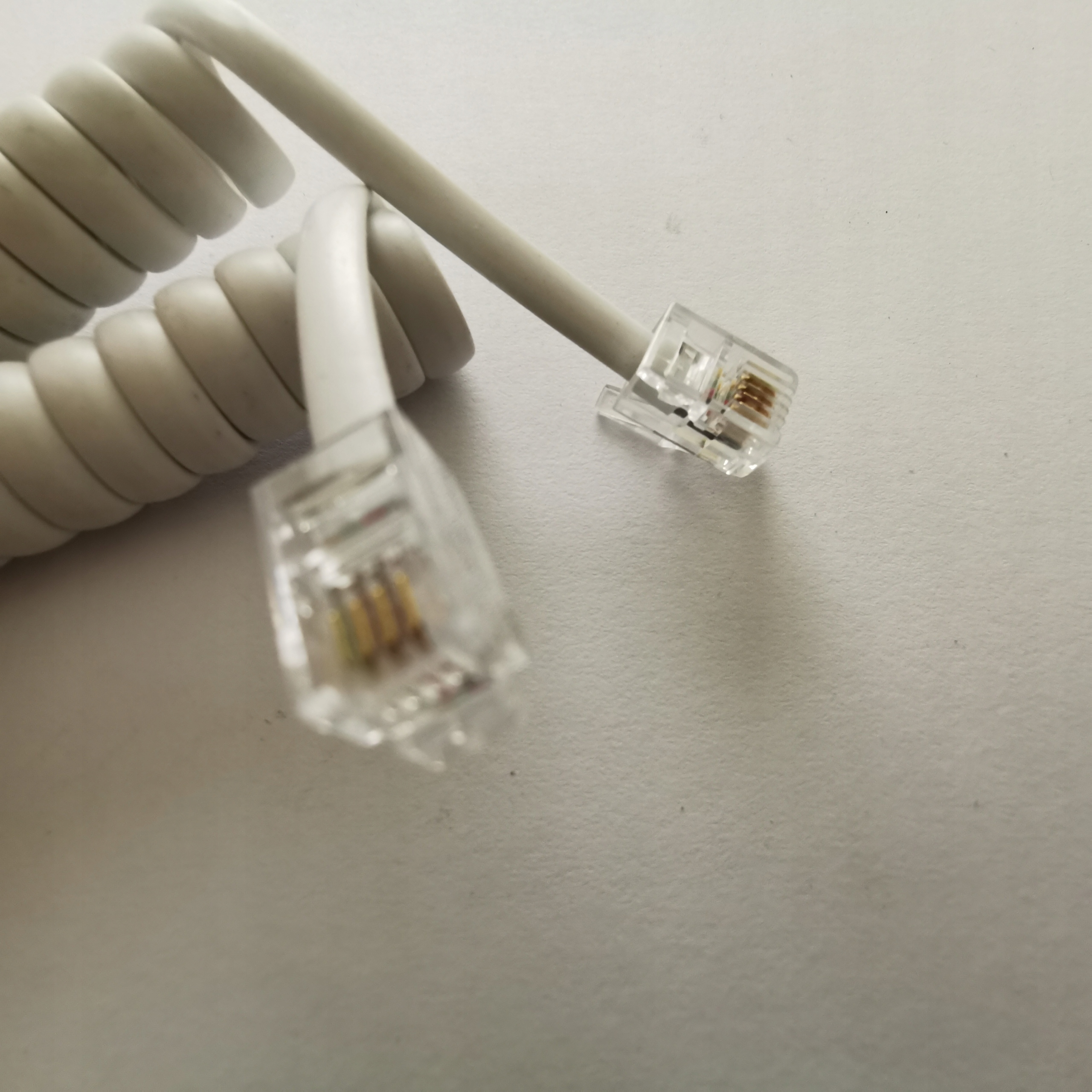 Kabel telefoniczny spiralny słuchawkowy 4m Biały