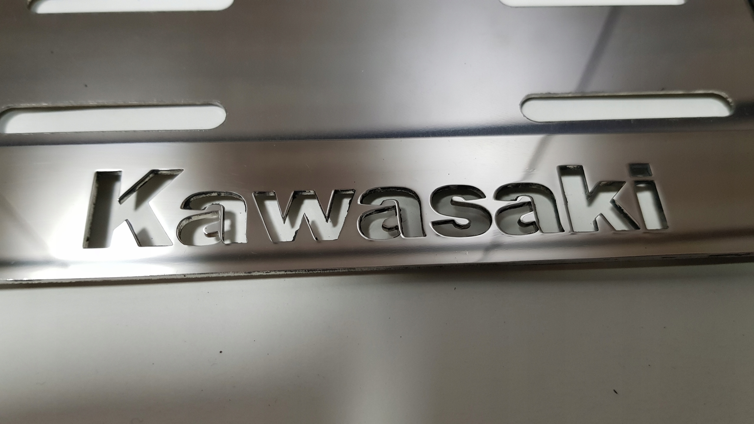 РАМКА НОМЕРНОГО ЗНАКА МОТОЦИКЛА KAWASAKI