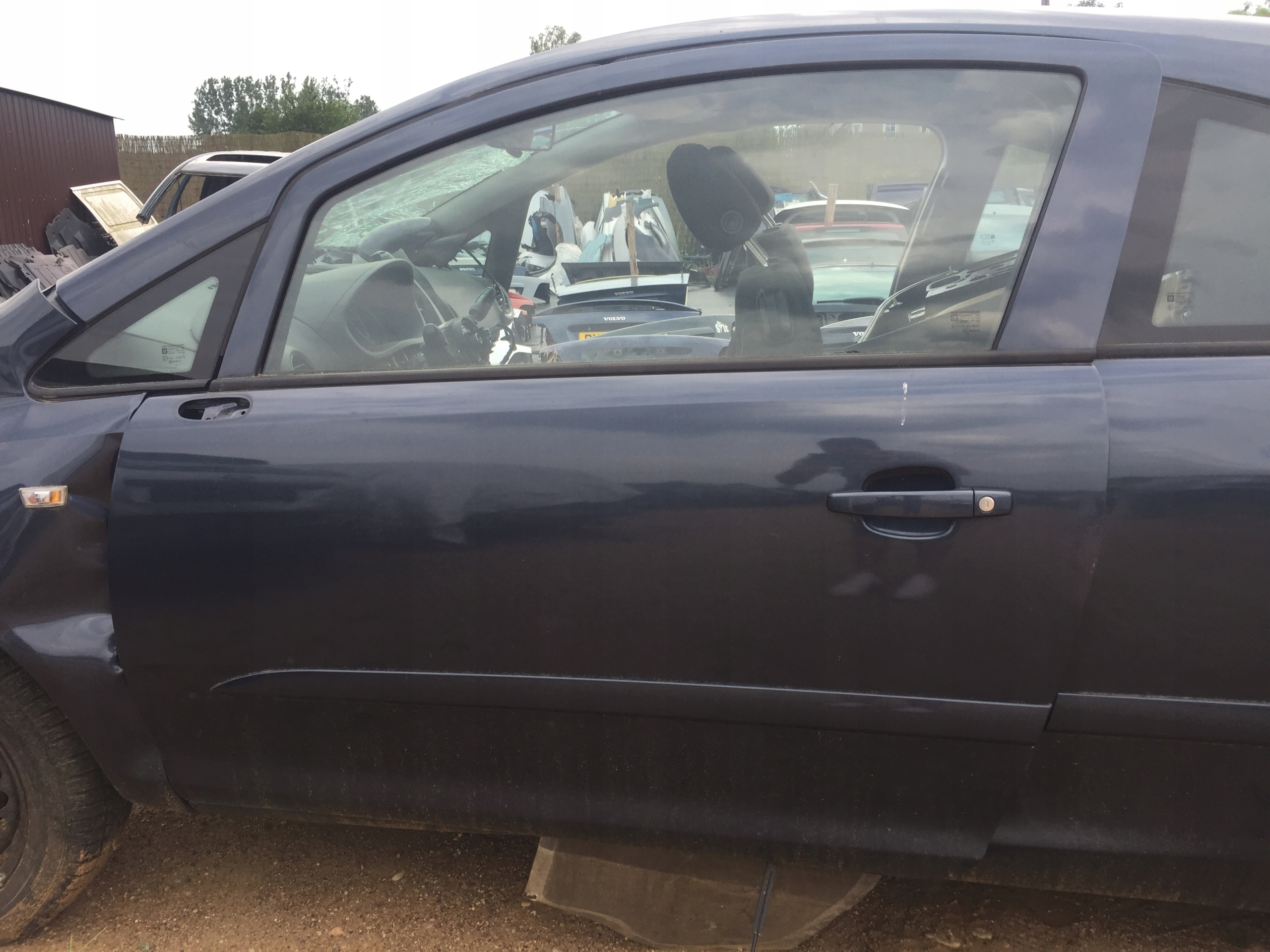 DRZWI PRZEDNIE LEWE OPEL CORSA D Z168