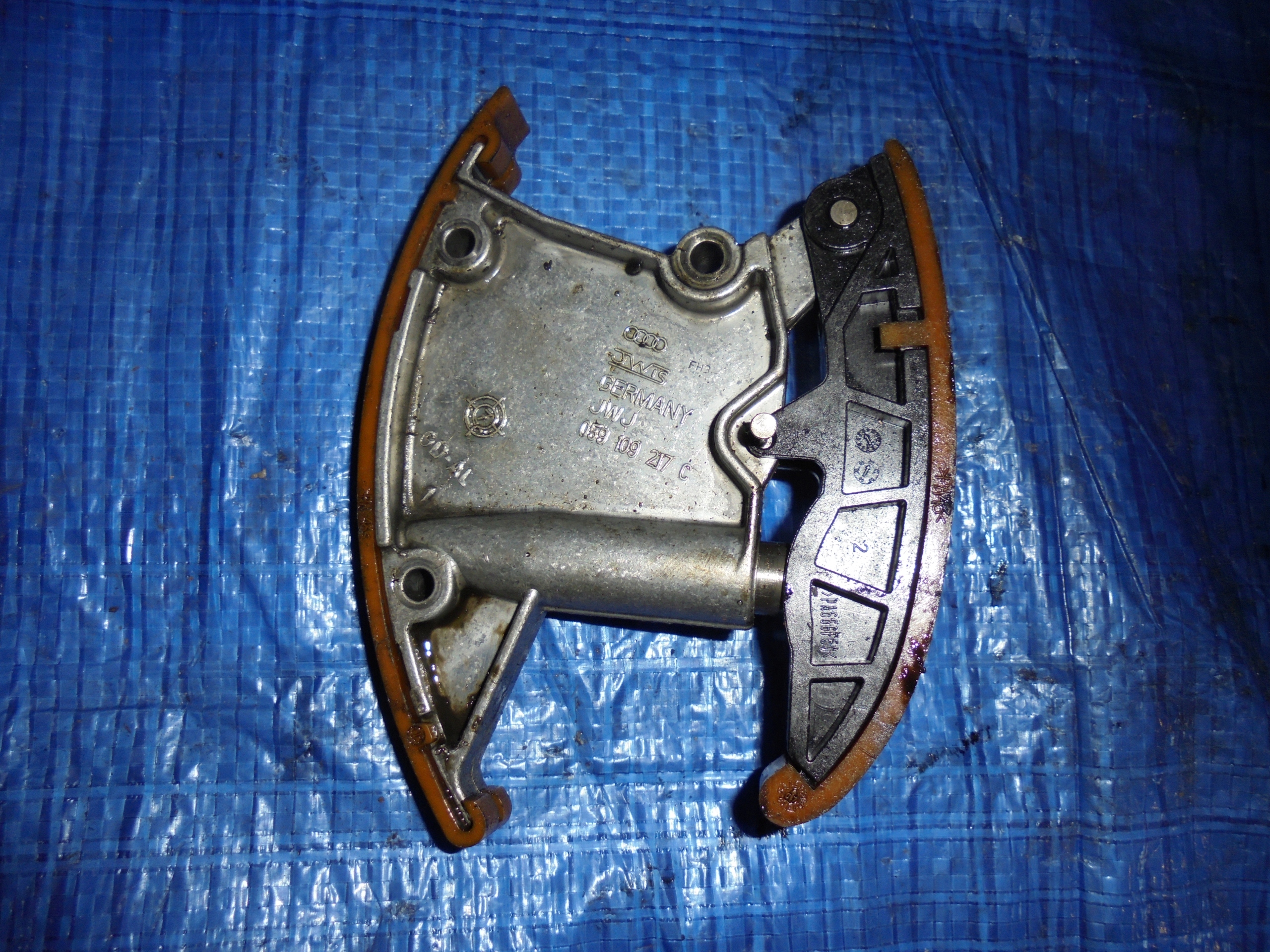 NAPINACZ ŁAŃCUCHA AUDI VW 3.0 TDI 059109217C