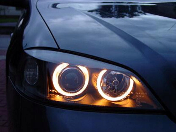 OPEL ASTRA II G 97-09 LAMPY reflektory CHROM ringi Wersja Europejska