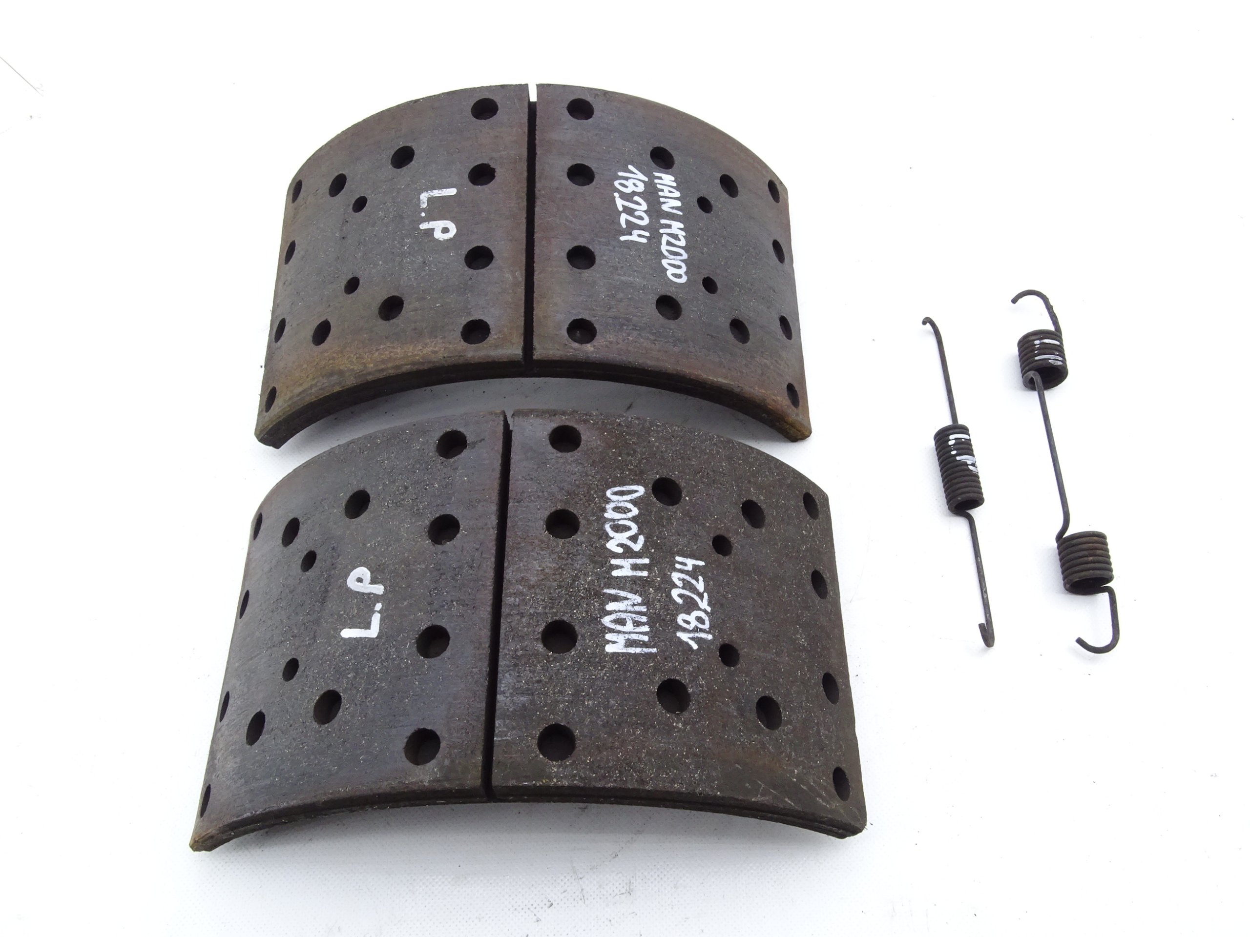 MAN L2000 M2000 гальмівні колодки лівий передній 22,5