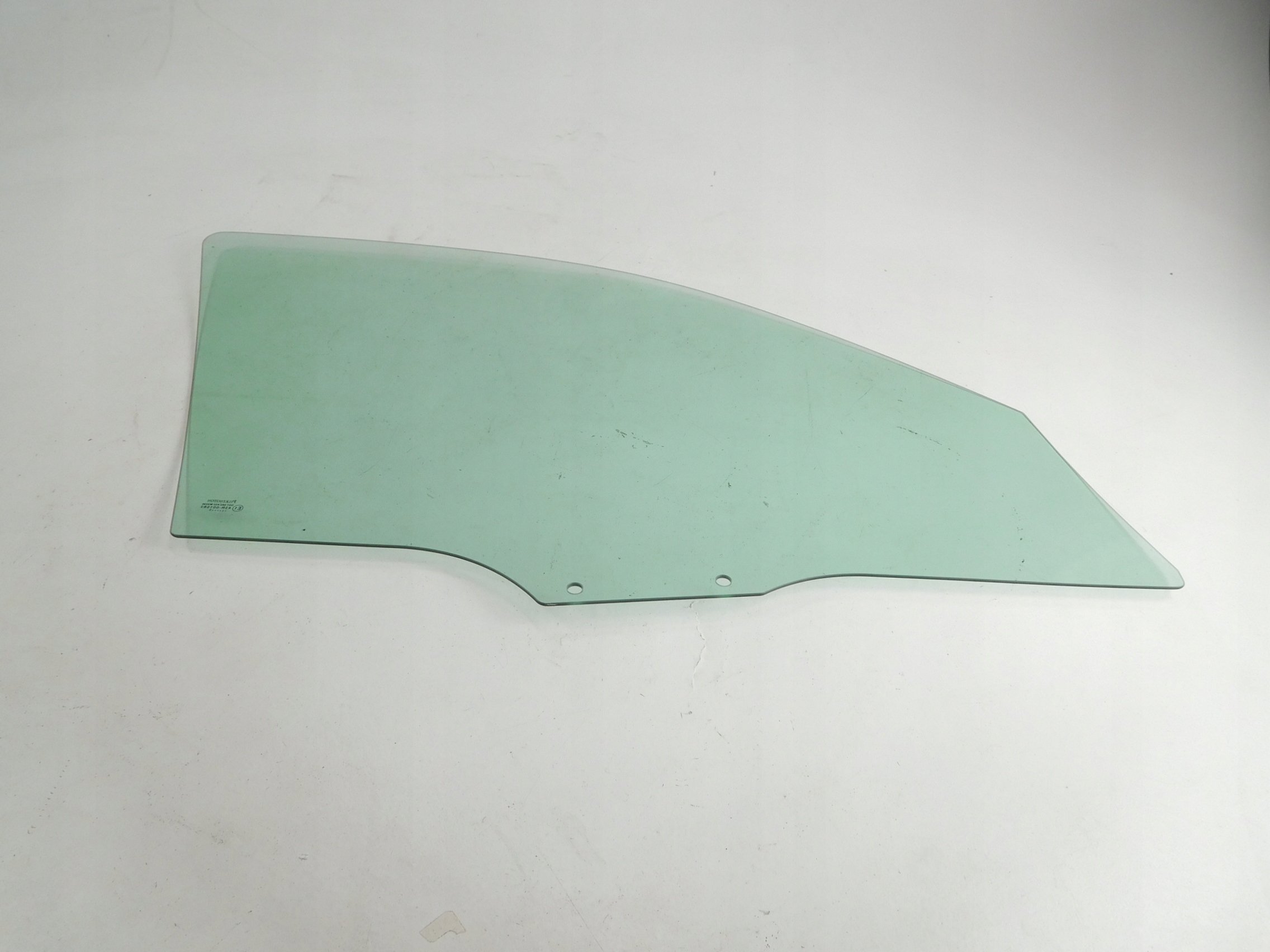 DD10595119E - ЛОБОВОЕ СТЕКЛО СЛЕВА СПЕРЕДИ MAZDA 2 03-07 DD10-59-511 9E