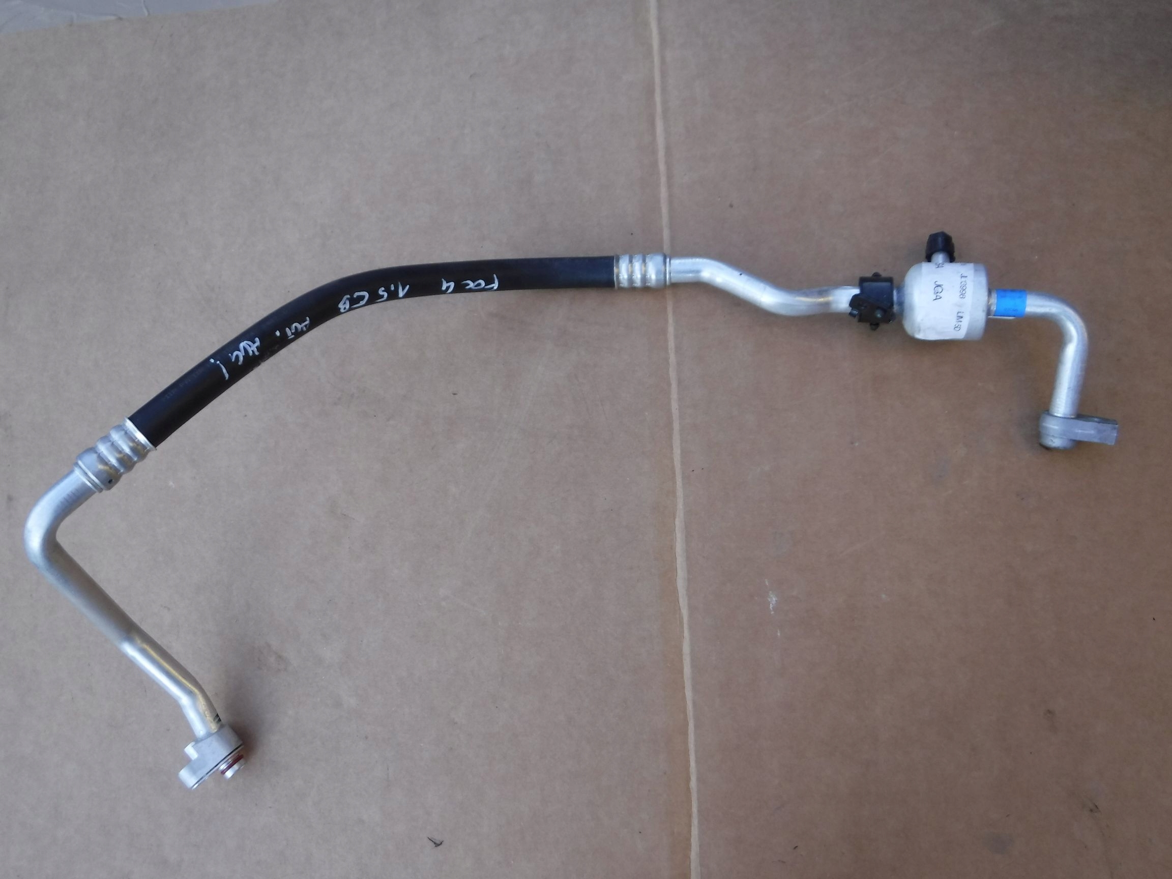 JX61-19N602-SA - ТРУБКА КОНДИЦИОНЕРА FORD FOCUS MK4 1.5 BENZ