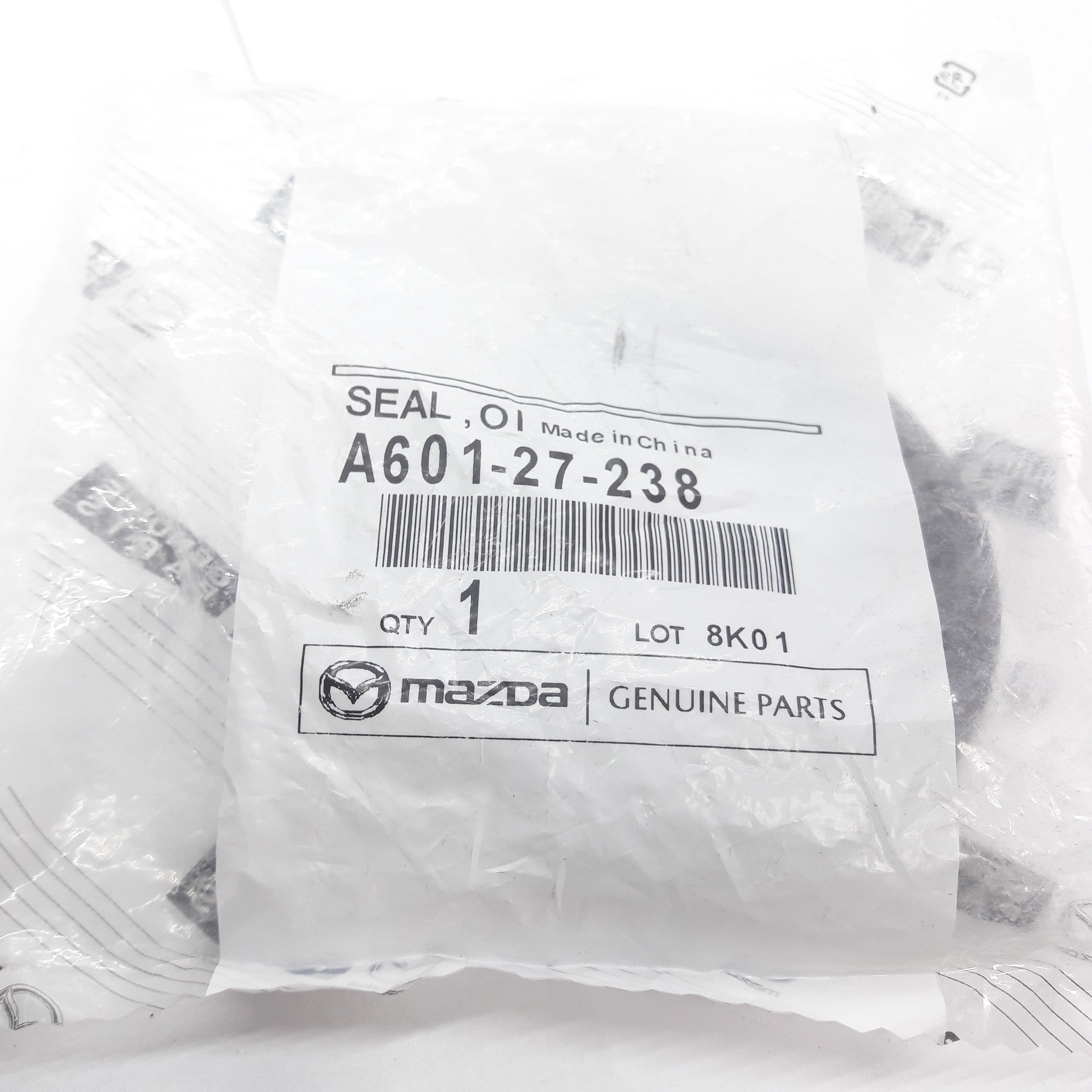 A601-27-238 - ГЕРМЕТИК ПОЛУОСИ ЛЕВОЙ MAZDA 3 5 6 02-07