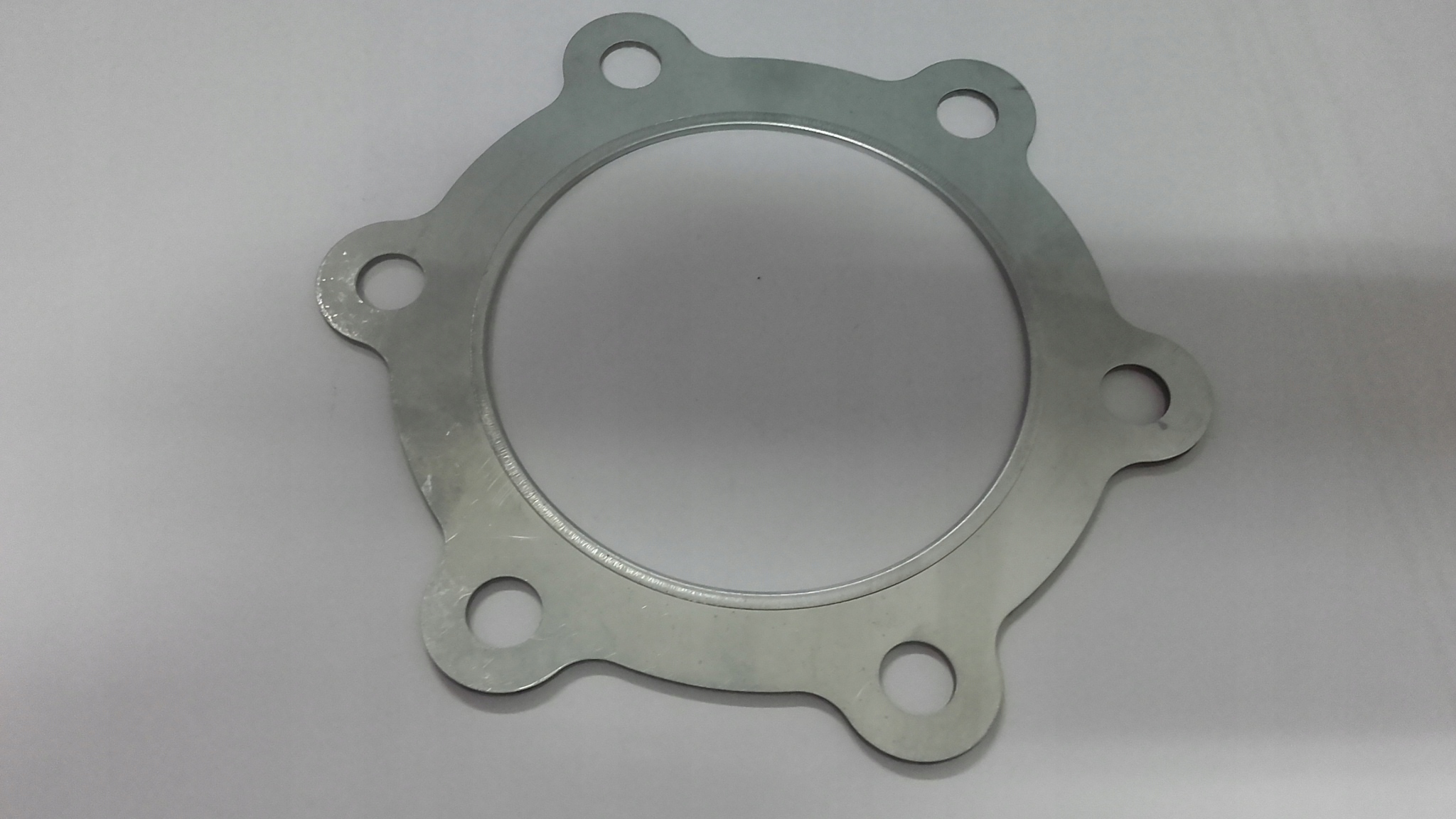 прокладка под турбину. прокладка под турбину. 0 tdi audi. 3. прокладка турбины камаз евро 3.