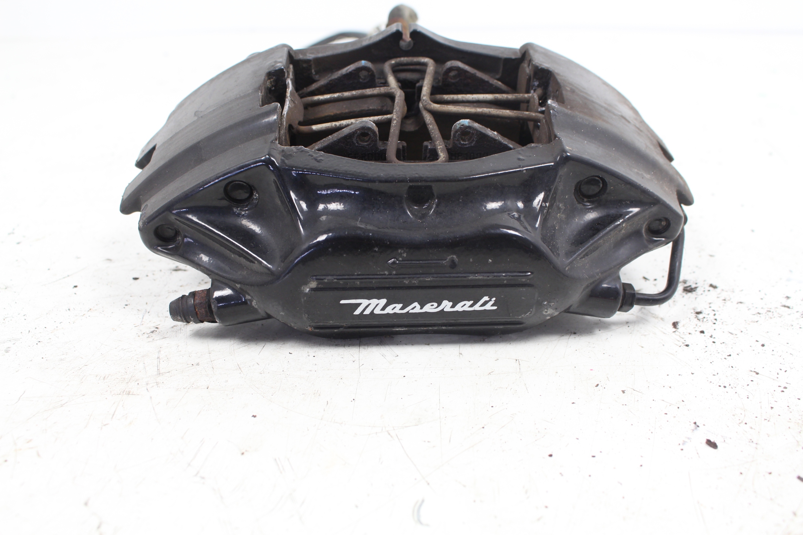 ZACISK LEWY TYŁ + KLOCKI MASERATI 3200GT 98-02