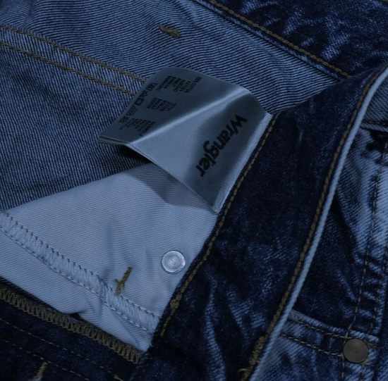 WRANGLER SLIDER super STONEWASH jeansy W34 L34 Model Slider