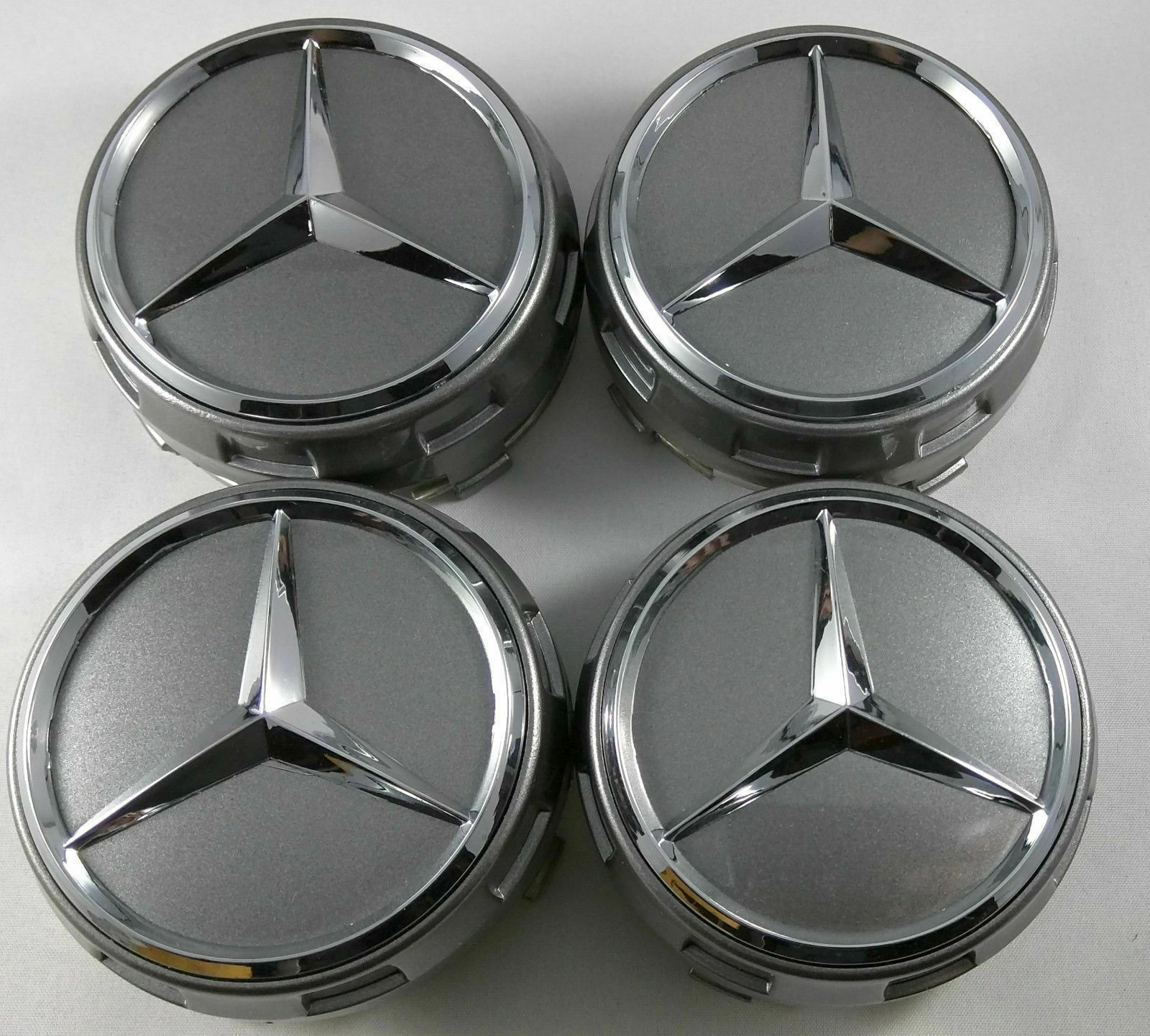 Куплю колпаки мерседес. Ступичный колпачок amg63. AMG 75mm Center caps. Колпачок ступицы Mercedes w212 AMG 75. Заглушка диска АМГ 75мм.