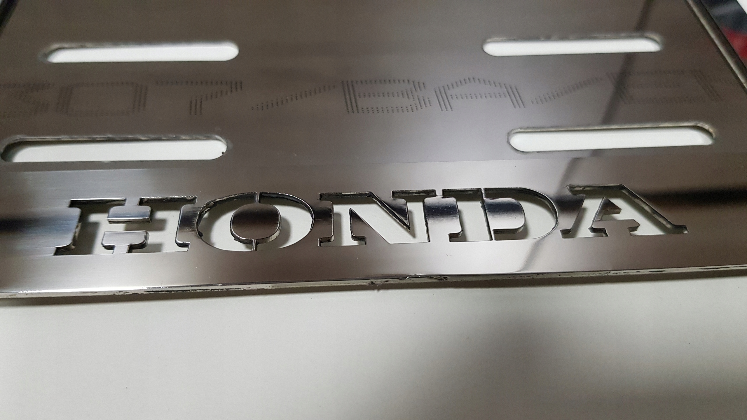 RAMKA TABLICY REJESTRACYJNEJ MOTOCYKLA HONDA Producent inny