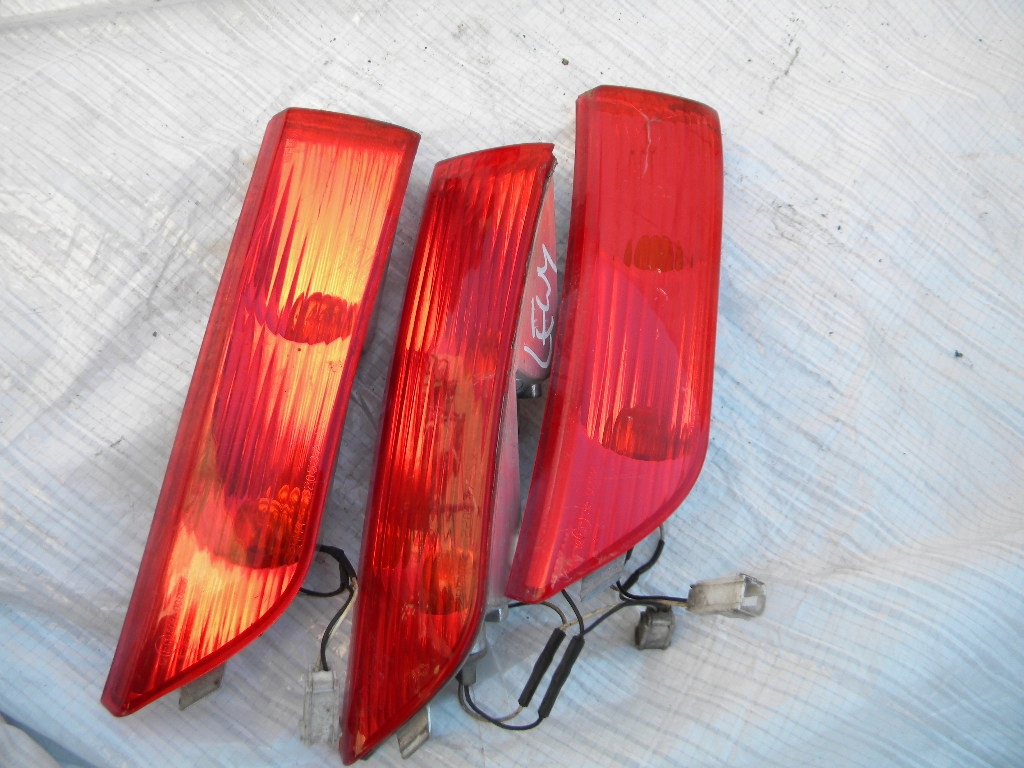 PIAGGIO X8 XEVO KIERUNKOWSKAZ TYŁ LEWY