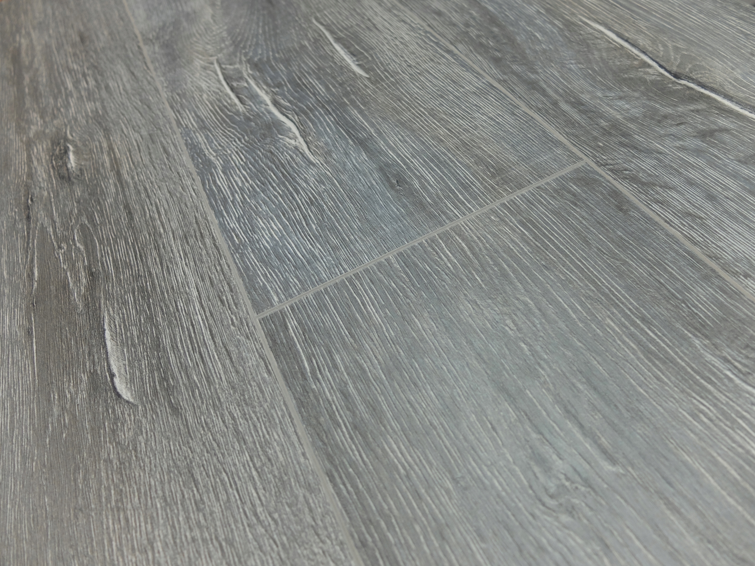 PANELE MAMUT TOUER OAK GRAU 12mm AC5 V-FUGA Producent Swiss Krono