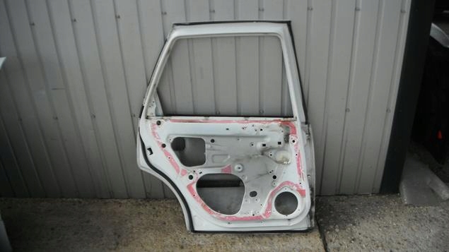 VECTRA B KOMBI 99-02 DRZWI LEWY TYŁ Strona zabudowy tył - lewa