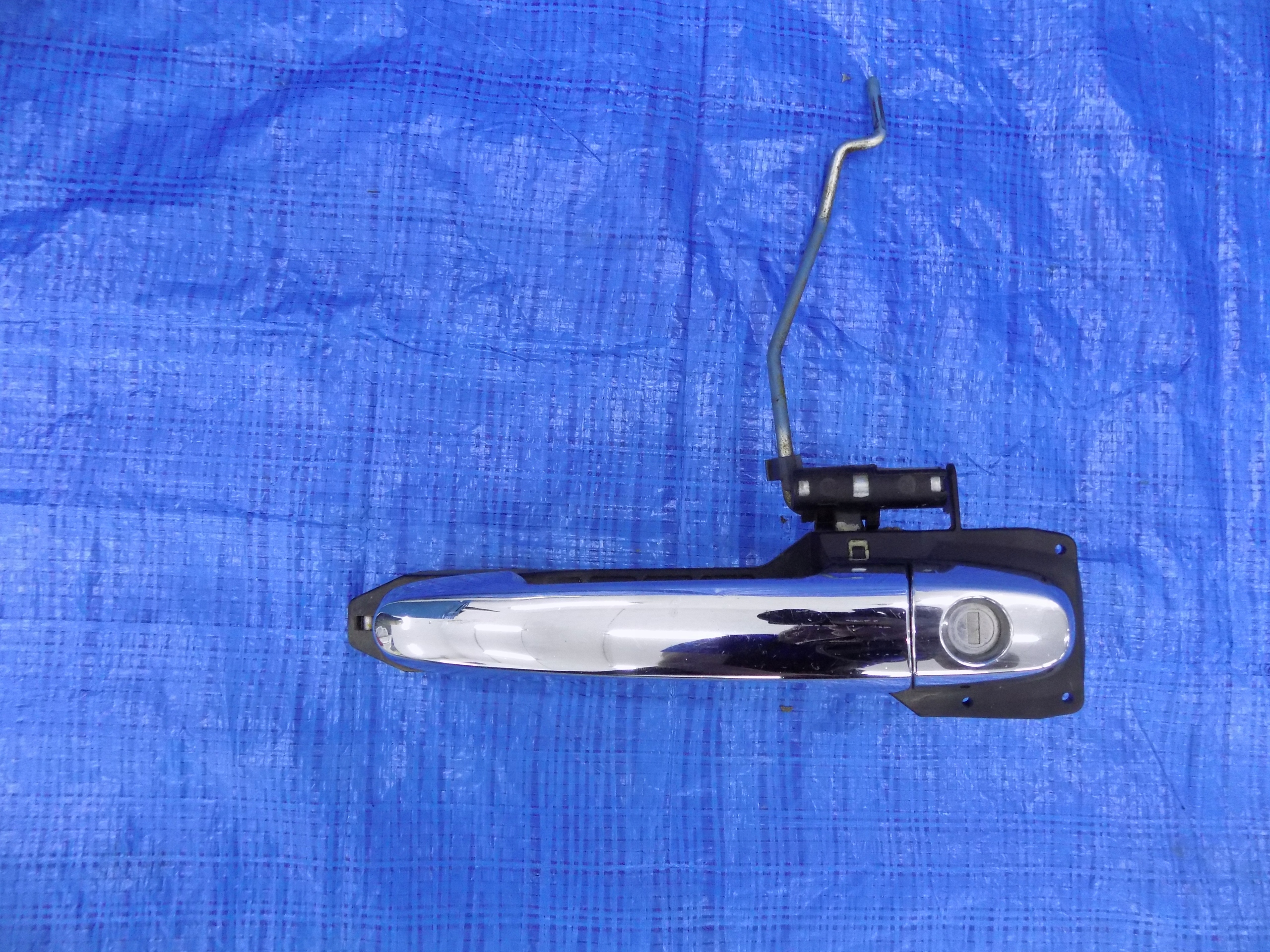 ДВЕРНА РУЧКА ЛІВА ПЕРЕДНЯ ЛІВА ХРОМ HILUX 2,5 D4D 05-11R