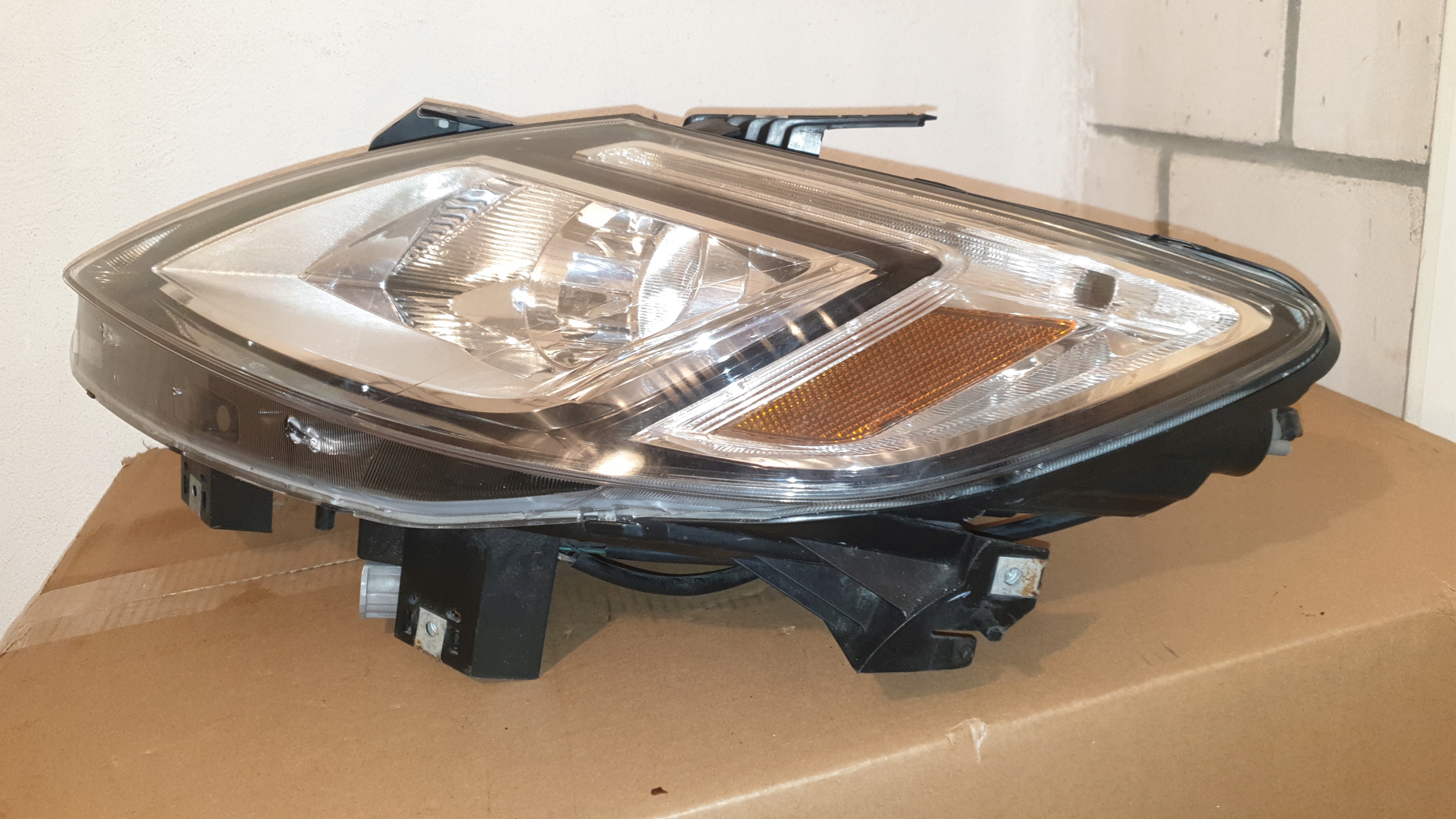 MAZDA CX9 20062009 REFLEKTOR LEWY LAMPA WERSJA EU