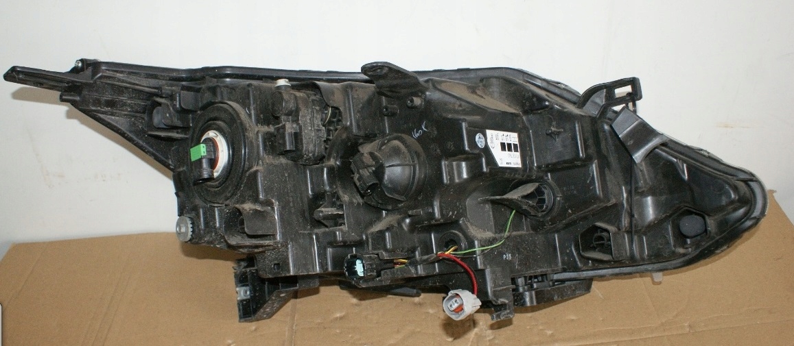 LAMPA LEWA ZWYKŁA NISSAN QASHQAI J11 14 7778666228