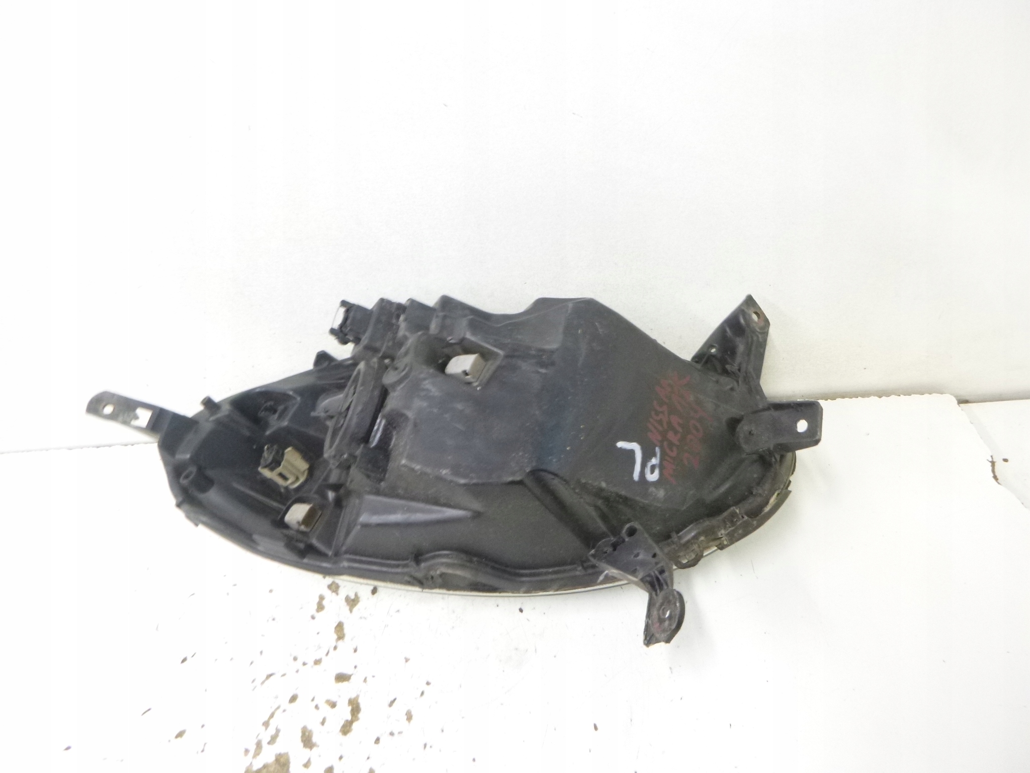 light front left Nissan Micra K12 2004r. 89007481