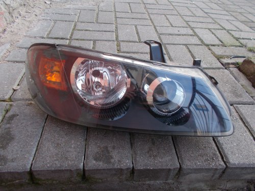 NISSAN ALMERA N16 03-06 LIFT PRAWA PRZEDNIA LAMPA ORYGINAŁ EUROPA