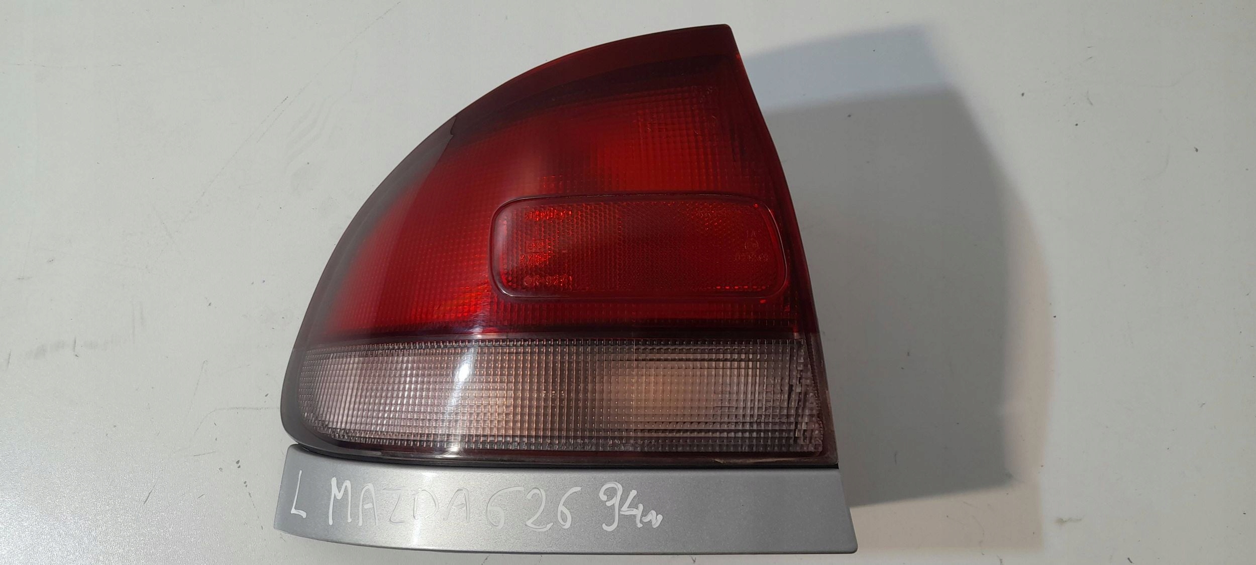 Mazda 626 sedan light rear left 0431392L (r483)