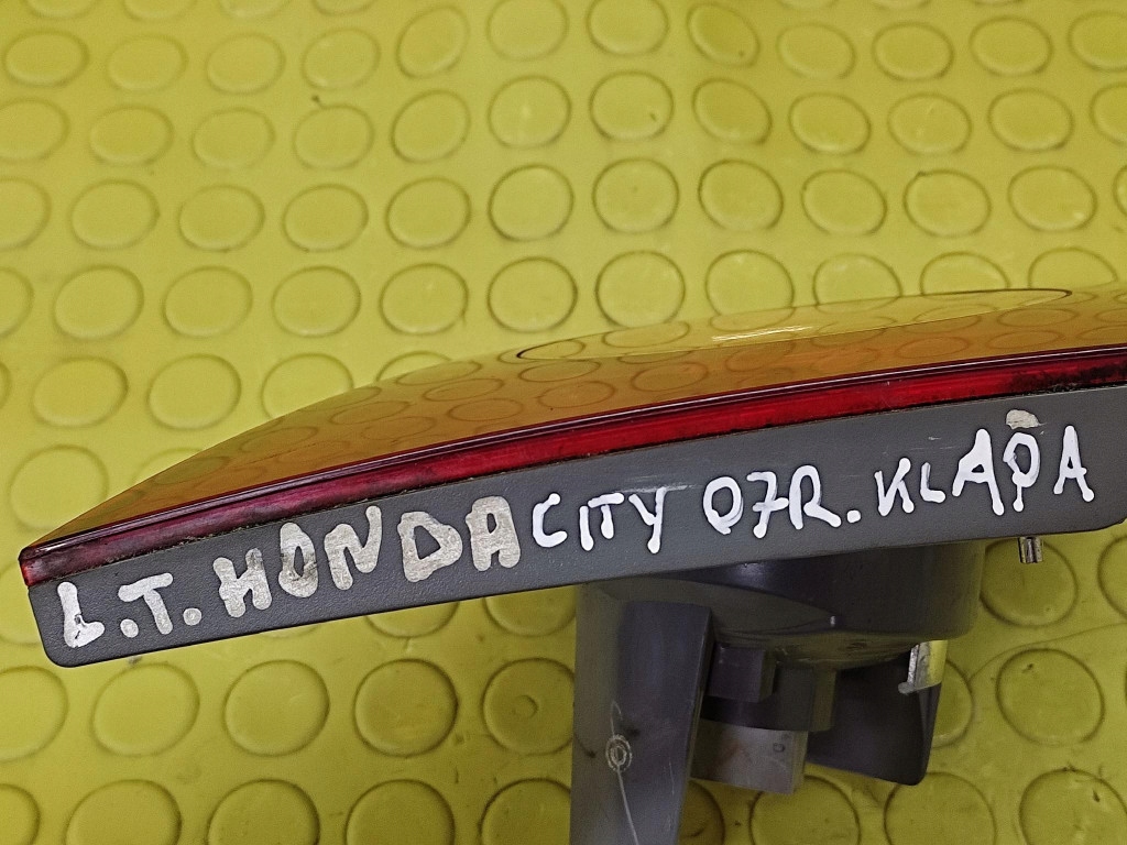 HONDA CITY light left rear part to the bonnet boot
