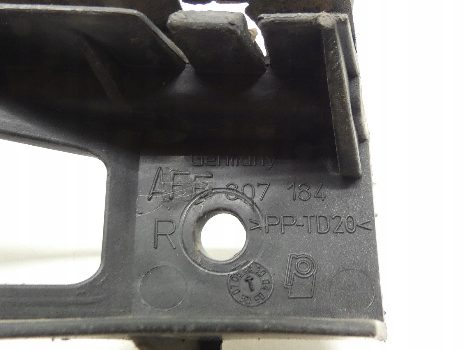 support holder bracket of a bumper right front VW PASSAT B6 AFF807184