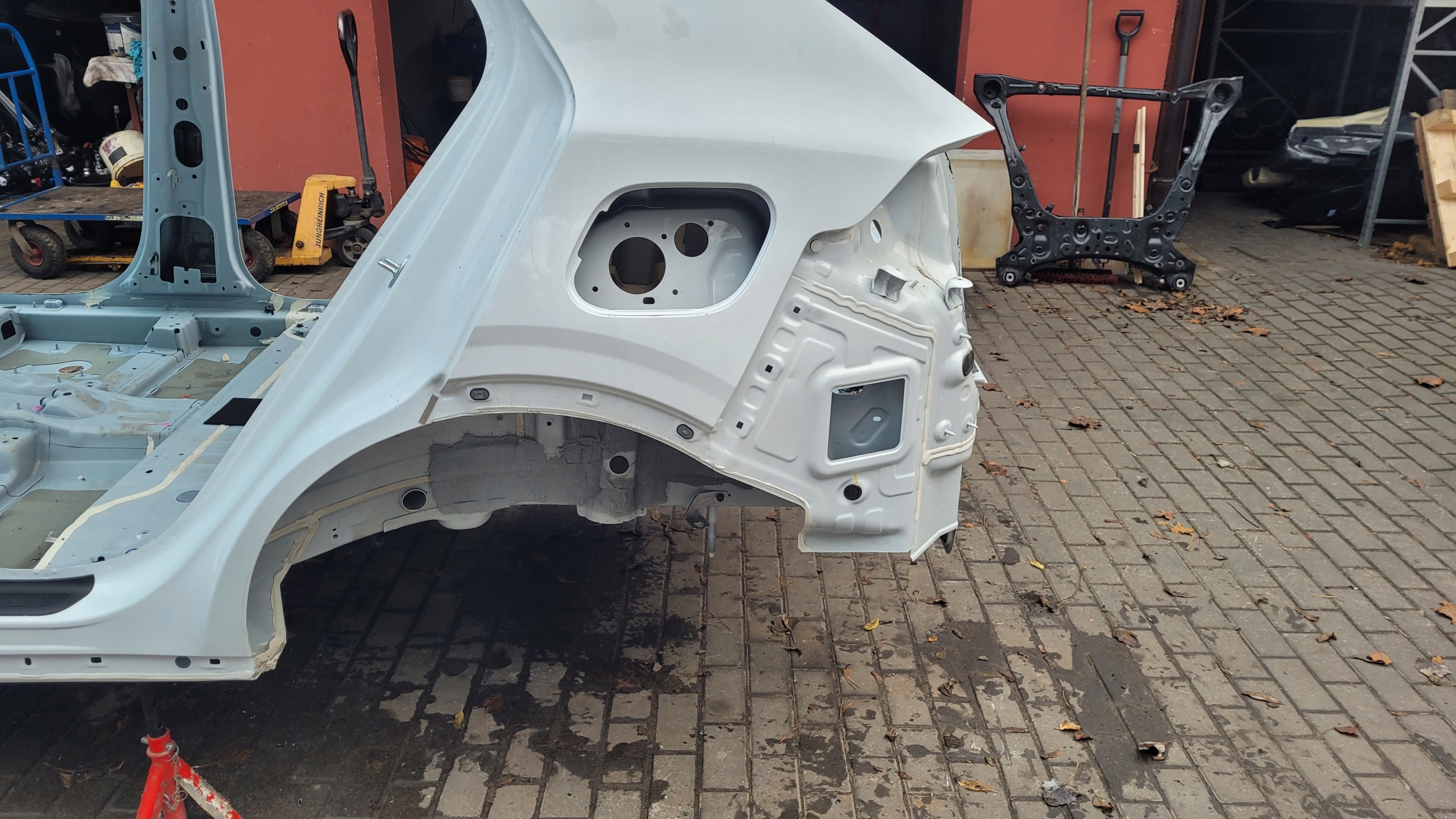 KIA SPORTAGE V 23r BŁOTNIK ĆWIARTKA LEWY TYŁ WD