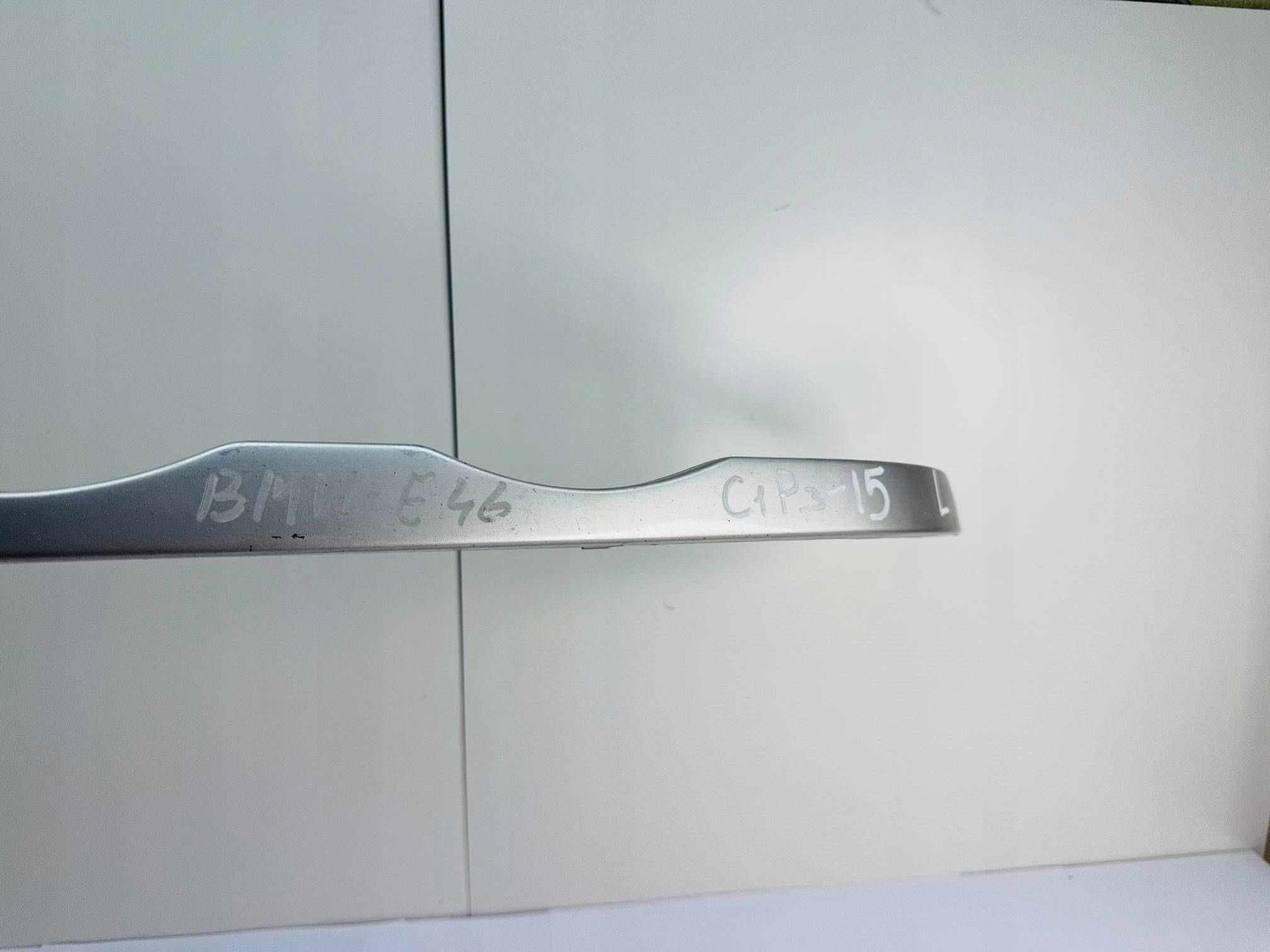 BMW 3 E46 moulding below reflektorem left 51138208481