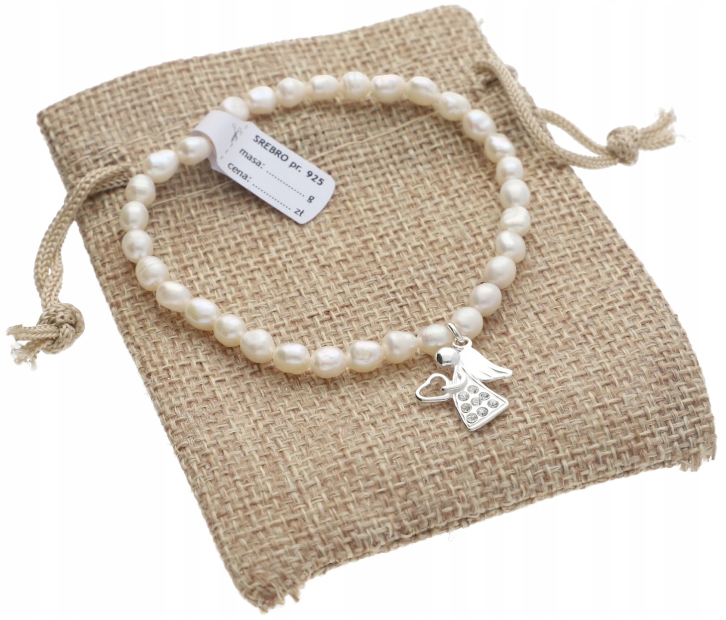 

Srebrna bransoletka z aniołkiem Komunia srebro925