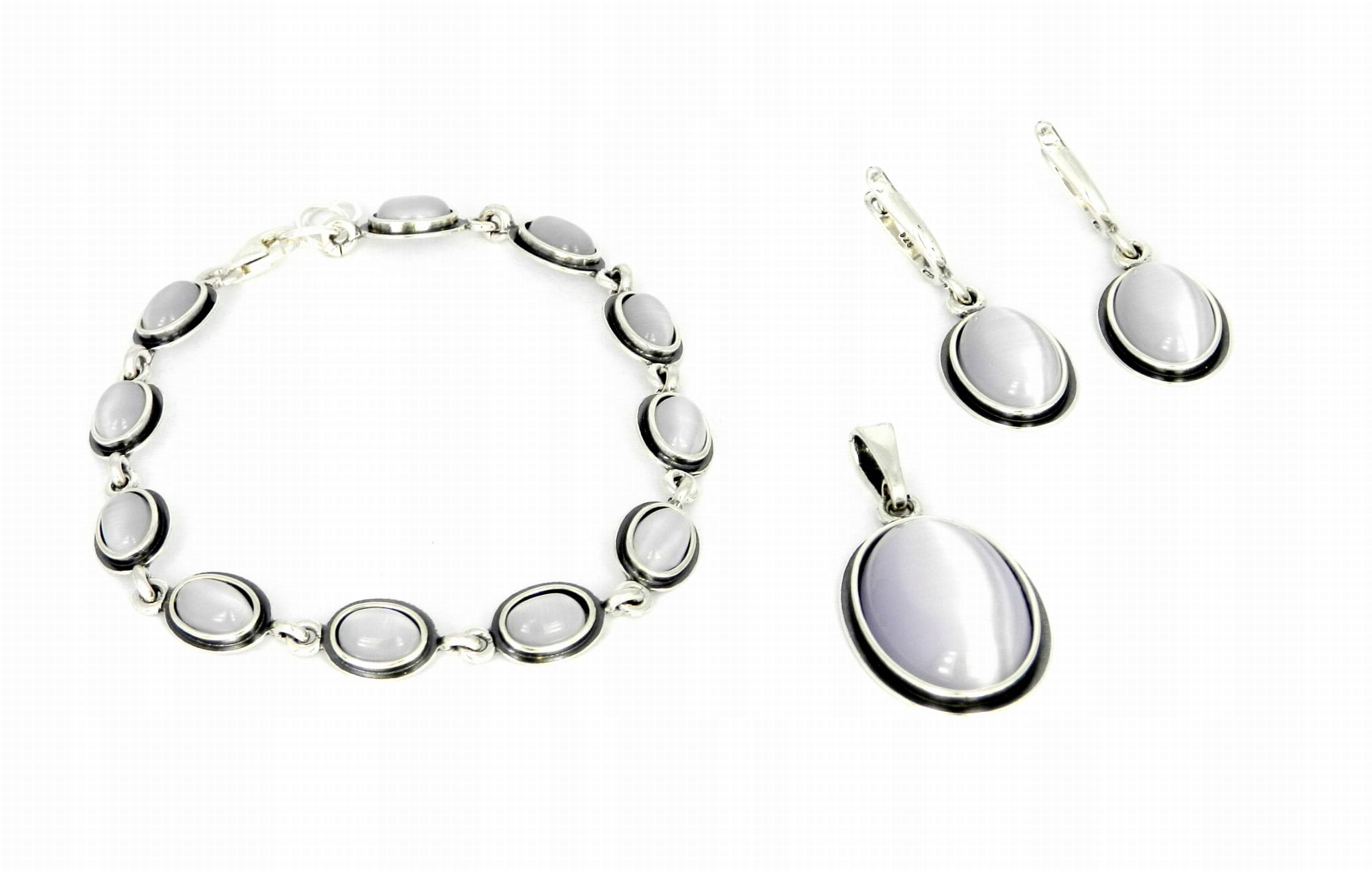 Komplet s reliéfem stříbro