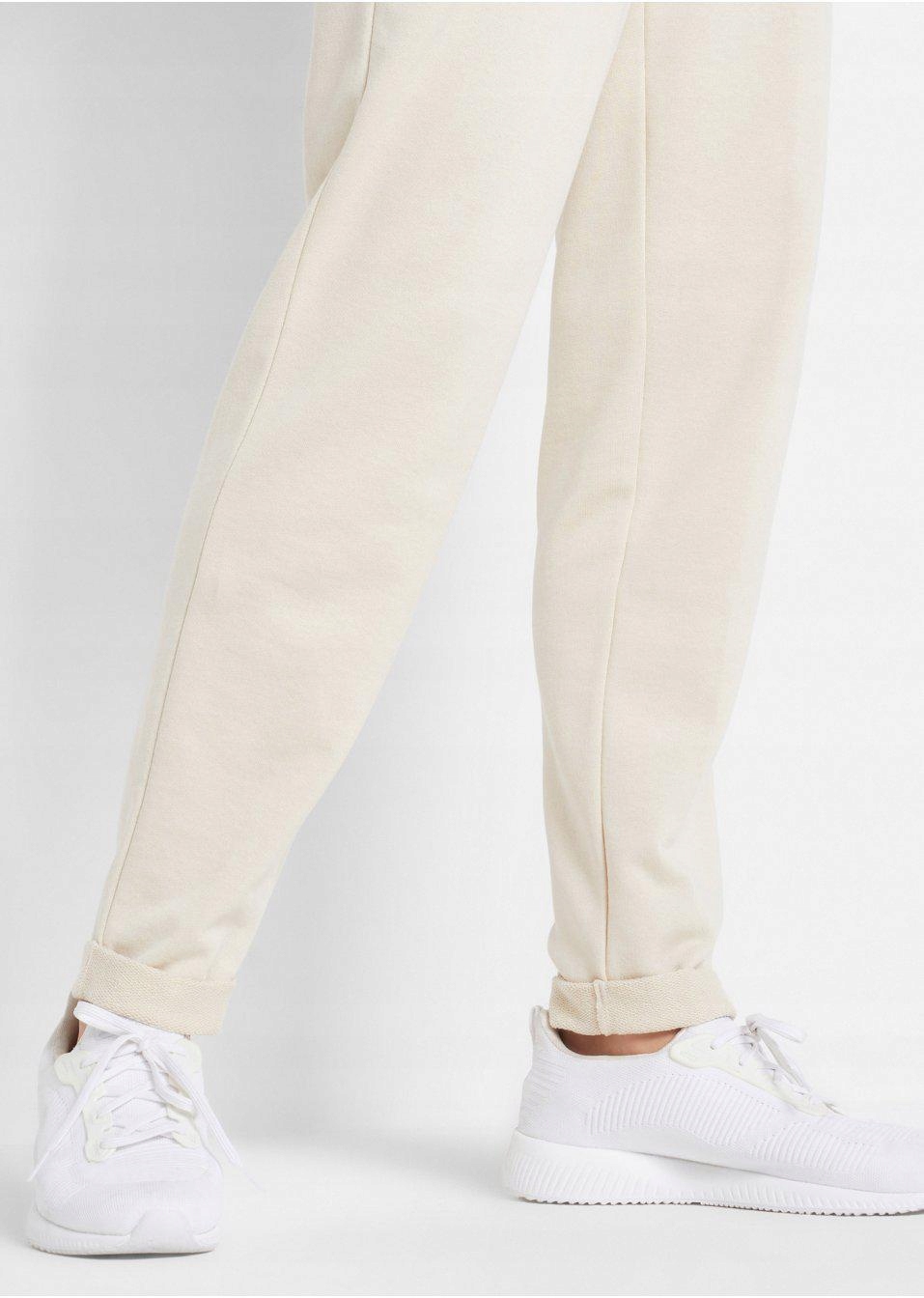 FI5017 BEŻOWE SPODNIE DRESOWE DAMSKIE__40 Stan (wysokość w pasie) średni