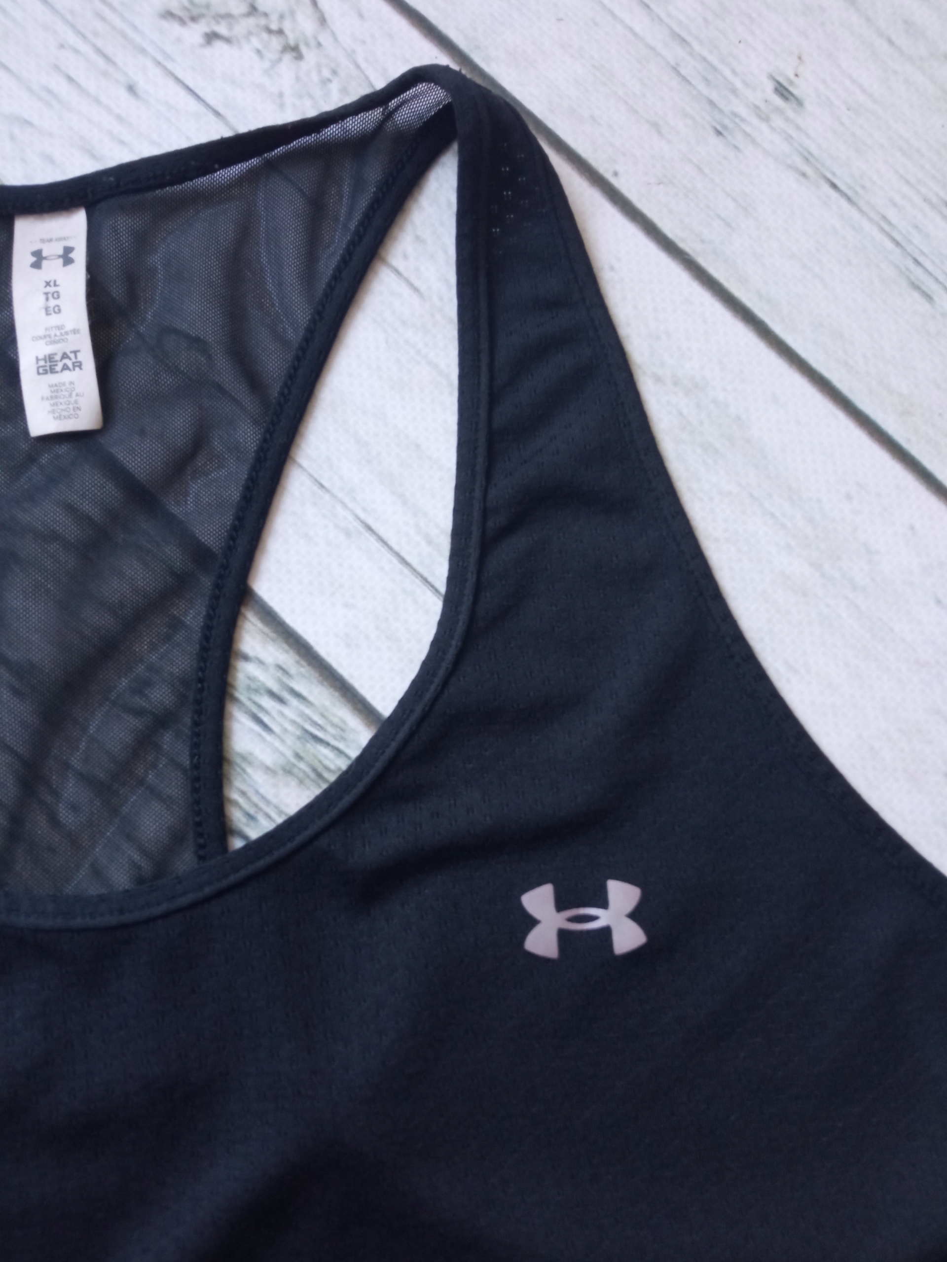 DAMSKA KOSZULKA SPORTOWA UNDER ARMOUR Materiał dominujący poliester