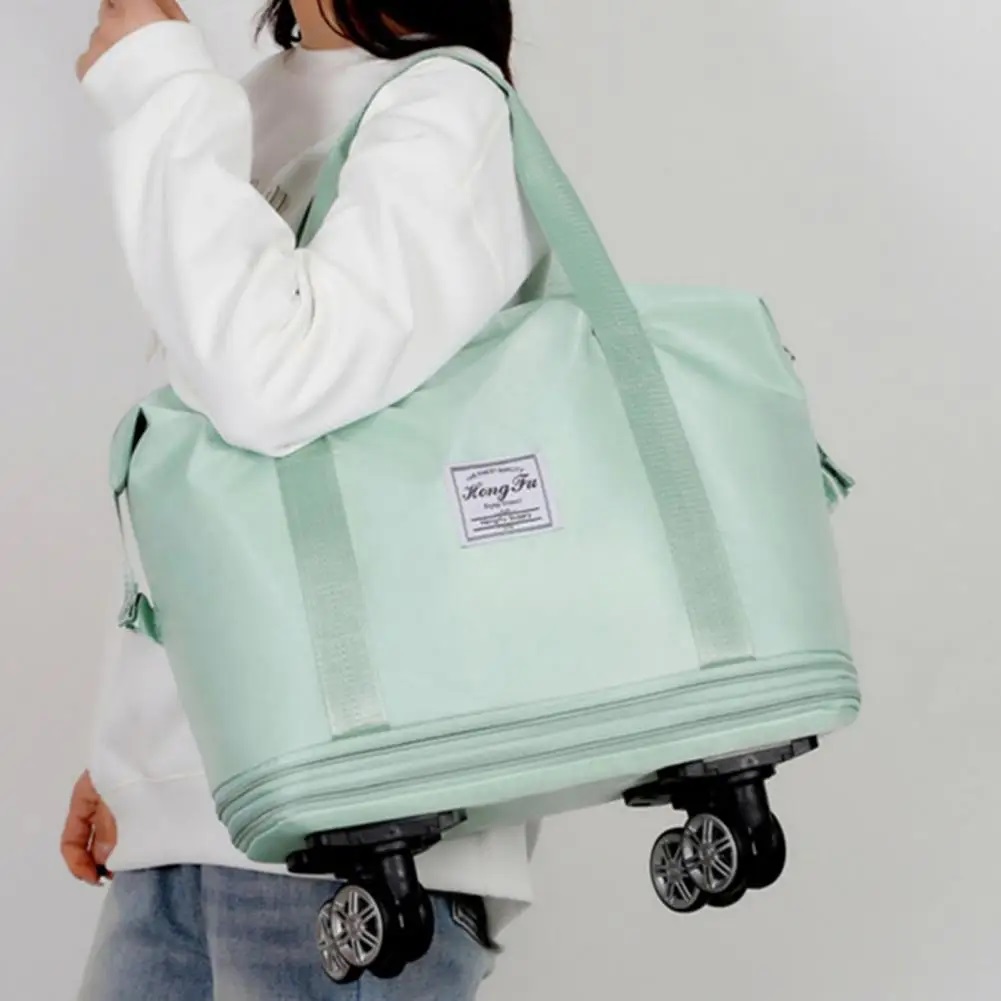 TORBA DUŻA PODRÓŻNA SPORTOWA SKŁADANA ROZKŁADANA NA KÓLKACH SAMOLOTOWA Model Torba podróżna typ 3 jasny  fiolet