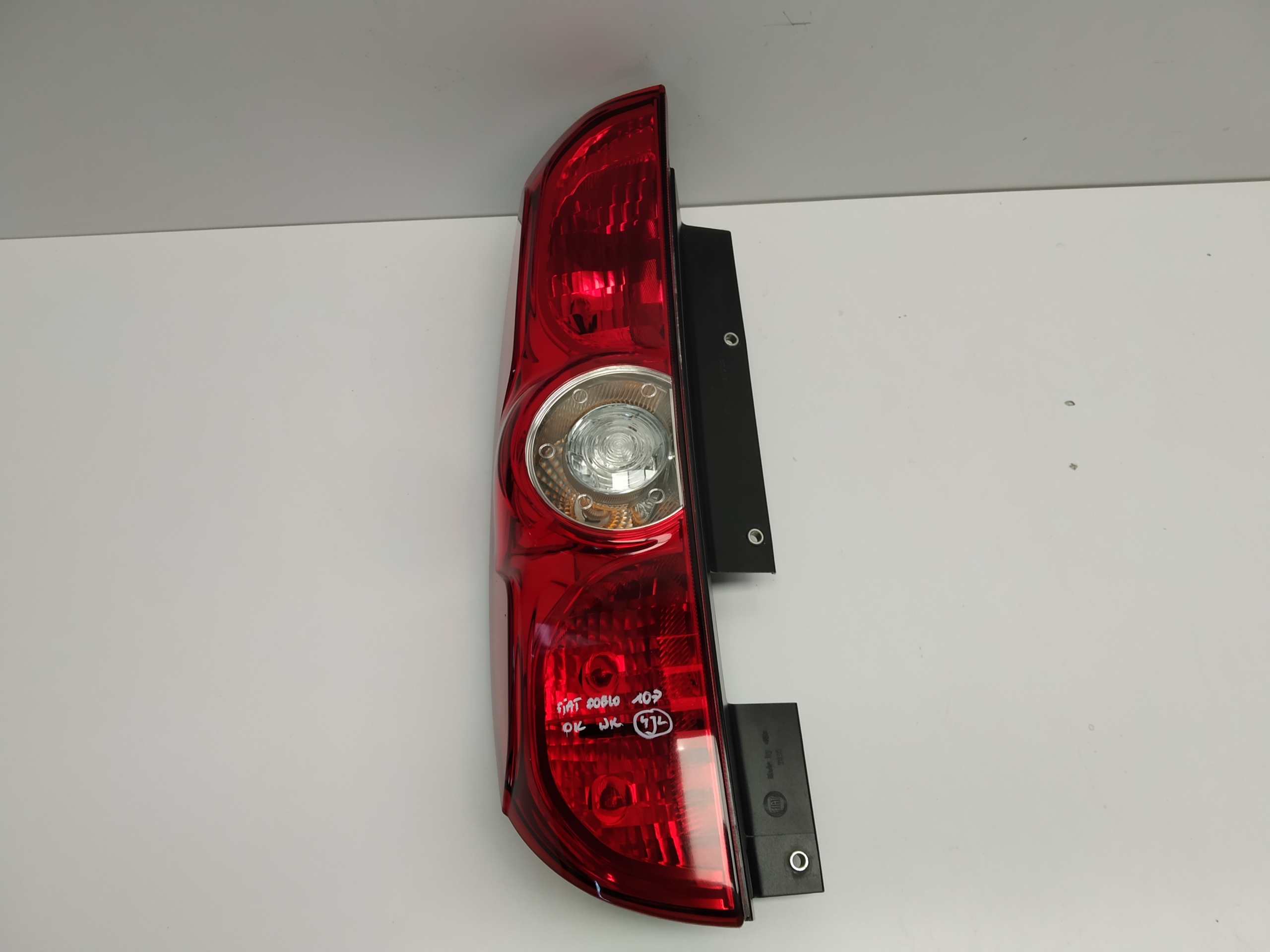 2010+ Doblo II Combo D light wklad rear part left door original