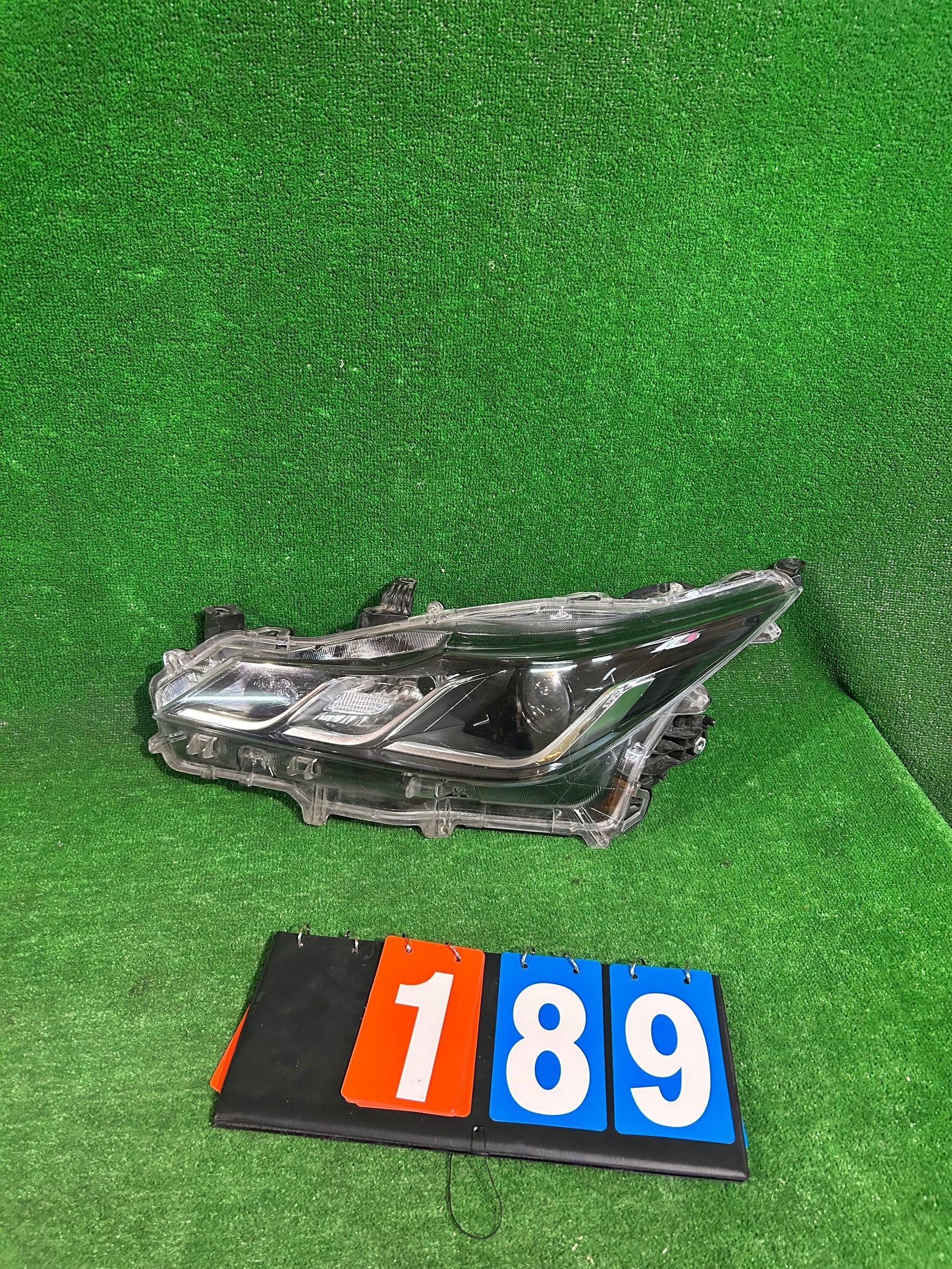REFLEKTOR left TOYOTA COROLLA E21 sedan LED NR.R189